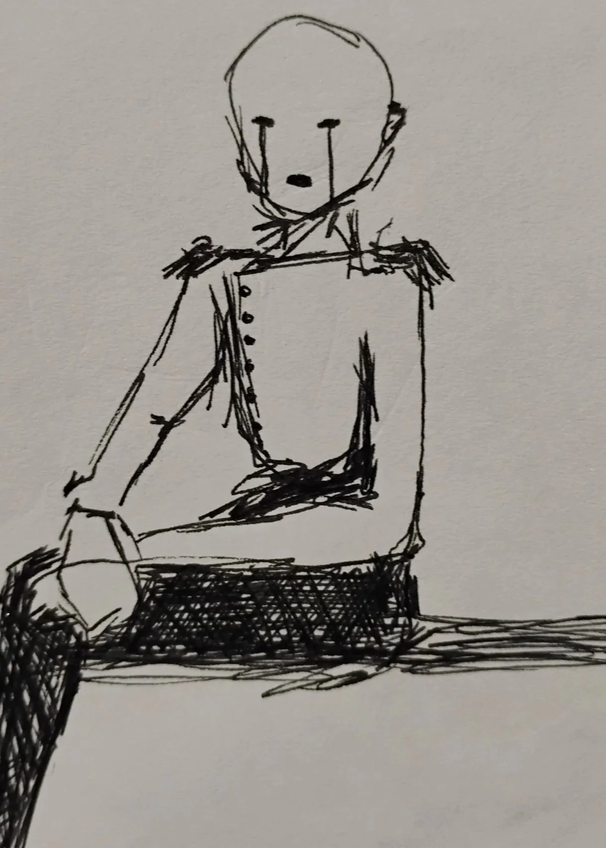 A black ink sketch of a person in a military uniform with epaulets, sitting with hands resting on the lap, on a flat surface.