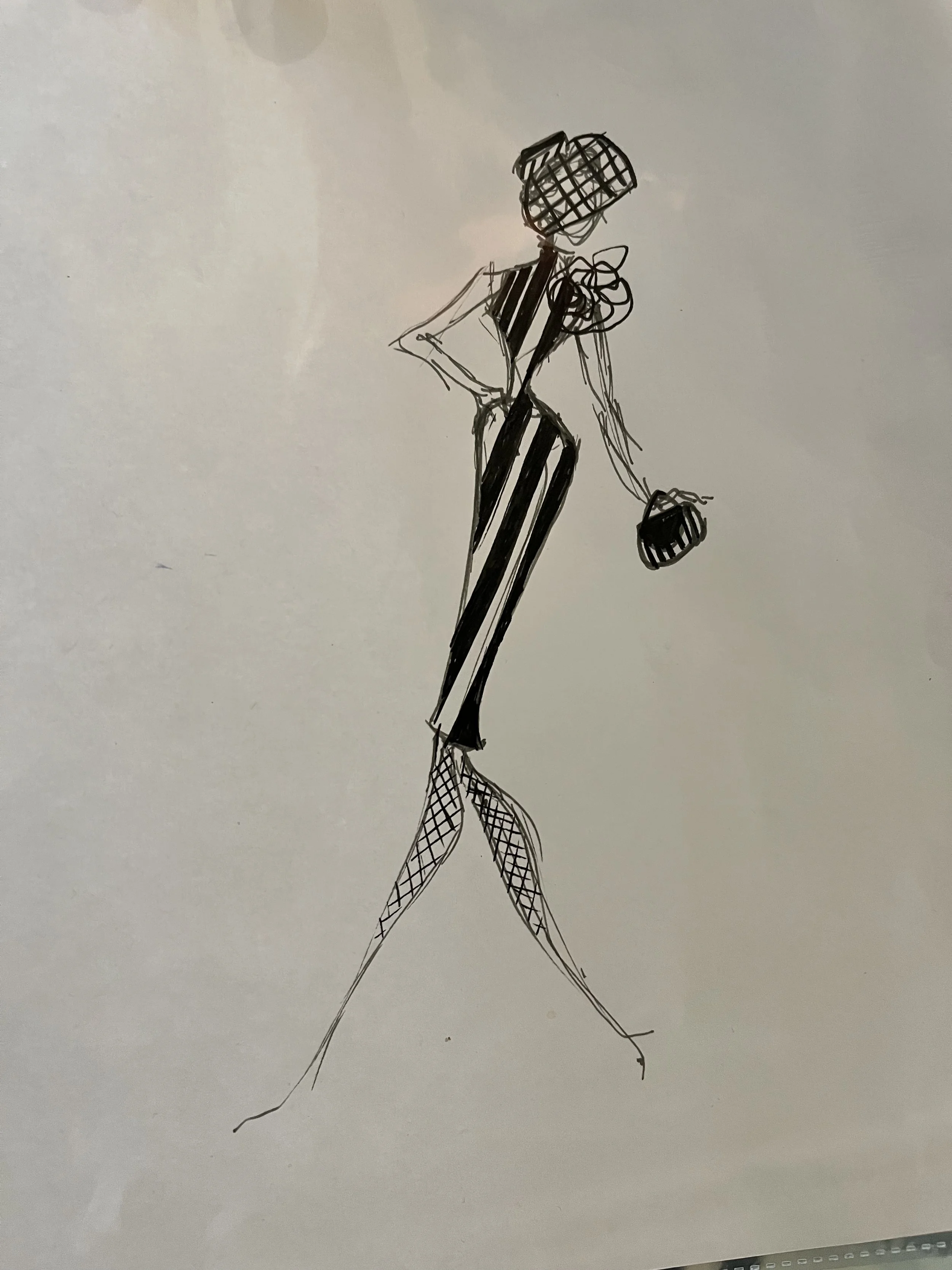 Fashion sketch of a woman in a striped outfit with fishnet stockings, carrying a small handbag.