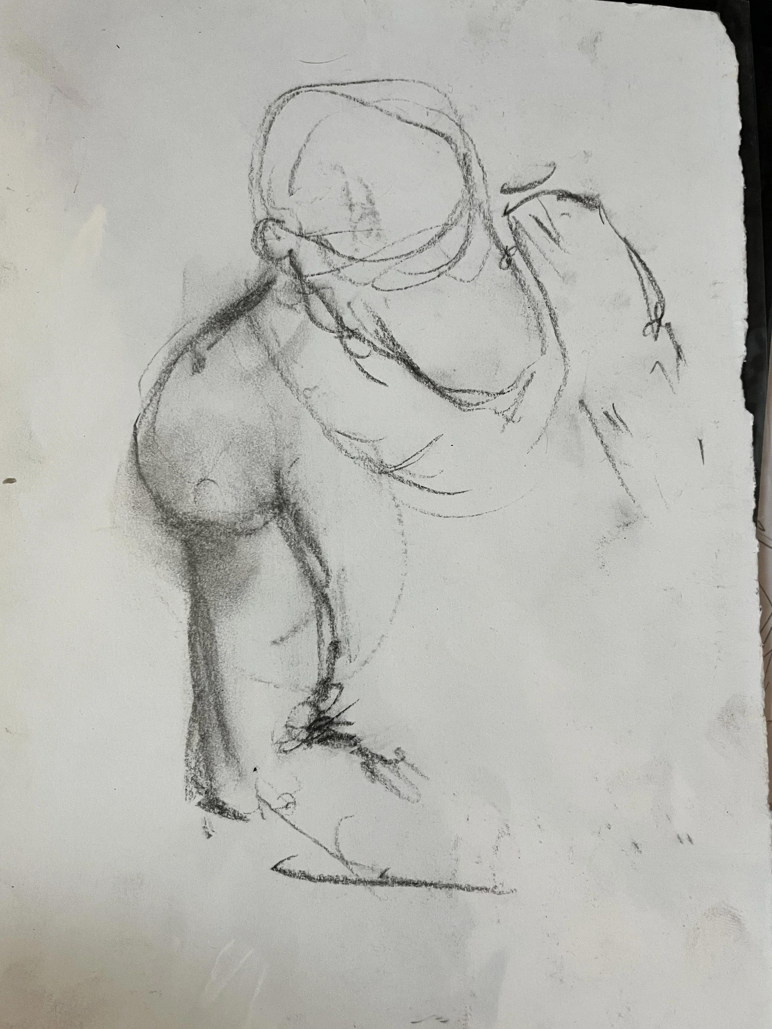 A rough pencil sketch of a person in a crouching or leaning forward pose, with sketchy lines and shading.