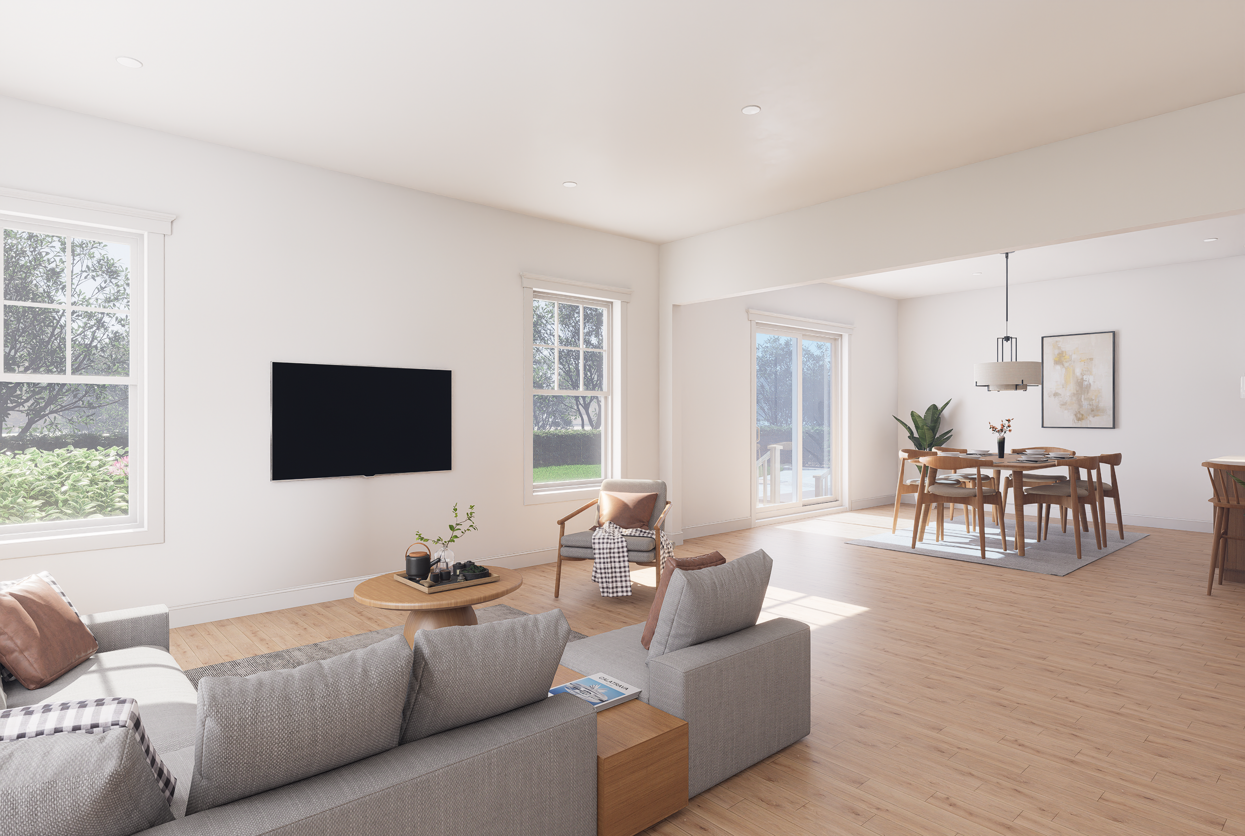 Bright living room and dining area with large windows, light hardwood floors, and minimalist decor.