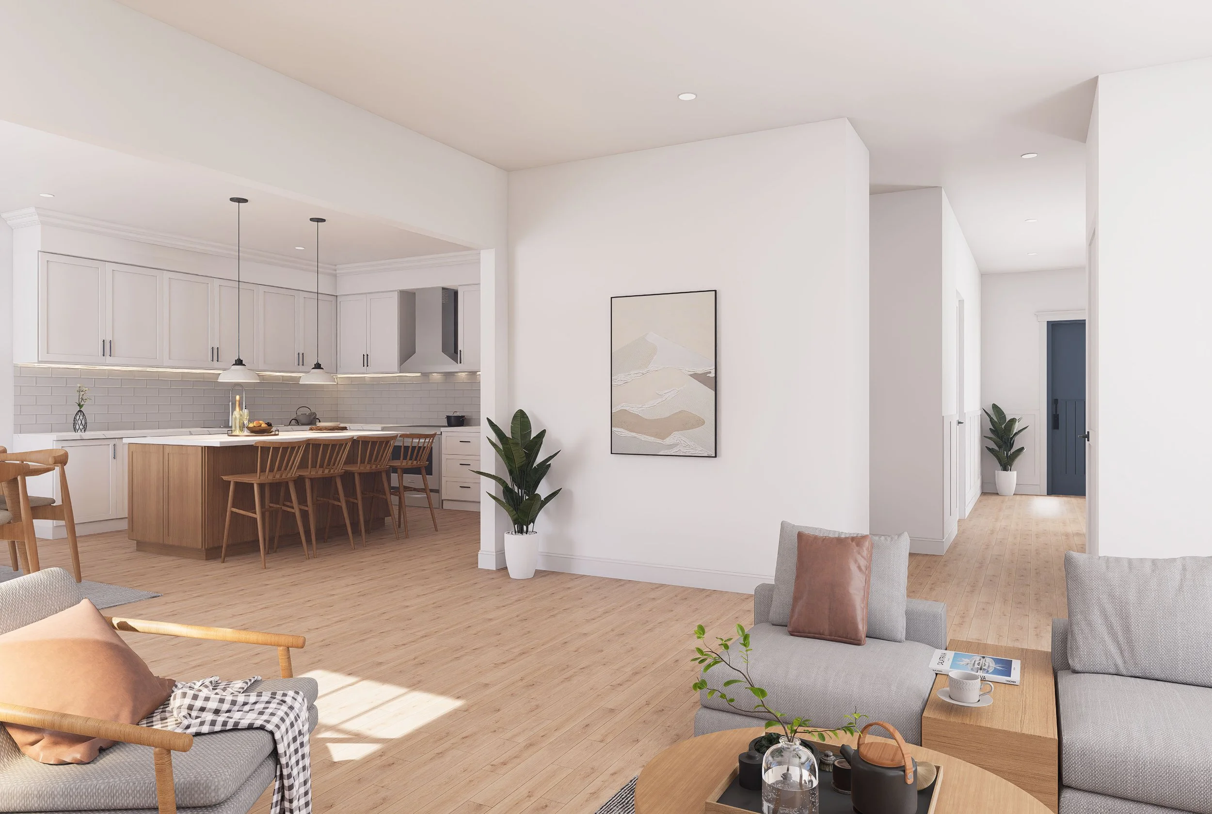 Open-concept living room and kitchen with white walls and light wood flooring, furnished with gray sofas, chairs, a wooden coffee table with a plant, and a kitchen island with wooden chairs, white cabinets, and pendant lights.