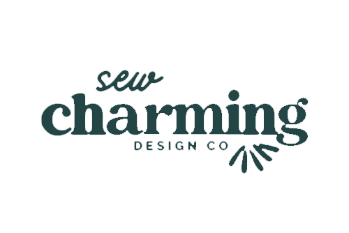 Logo for Sew Charming Design Co. with stylized text and decorative element.