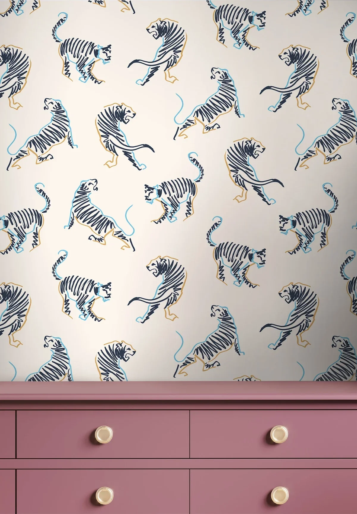 Patterned wallpaper with blue and black outlined tigers and yellow and blue lines, and a pink dresser with round beige knobs.