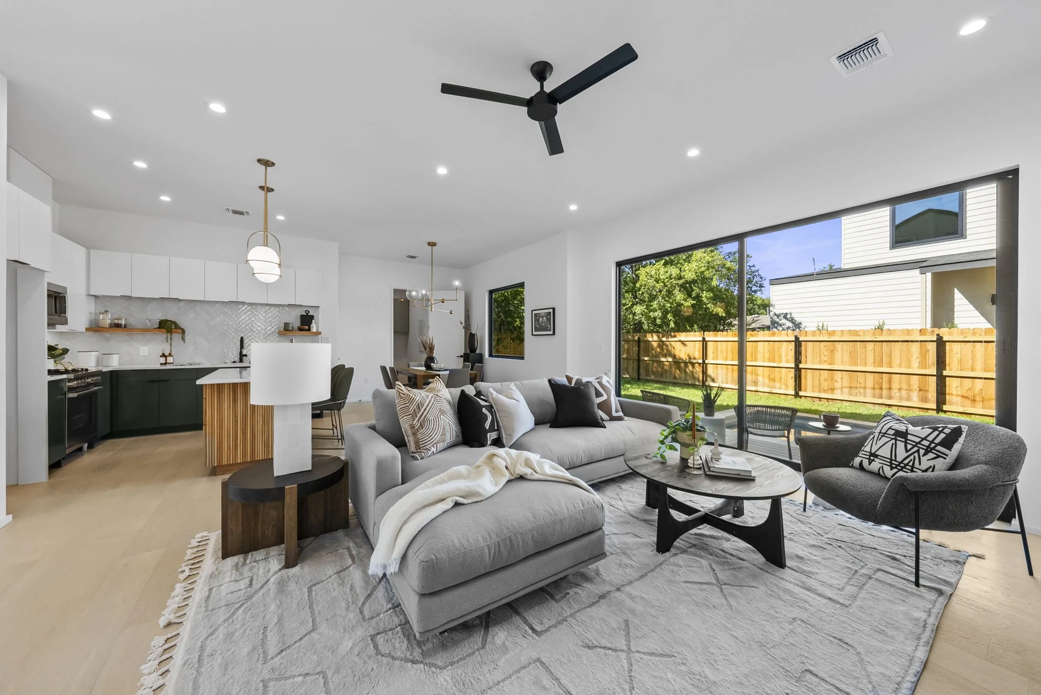 Unit 1 Living area, open kitchen and dining room, with direct pool access