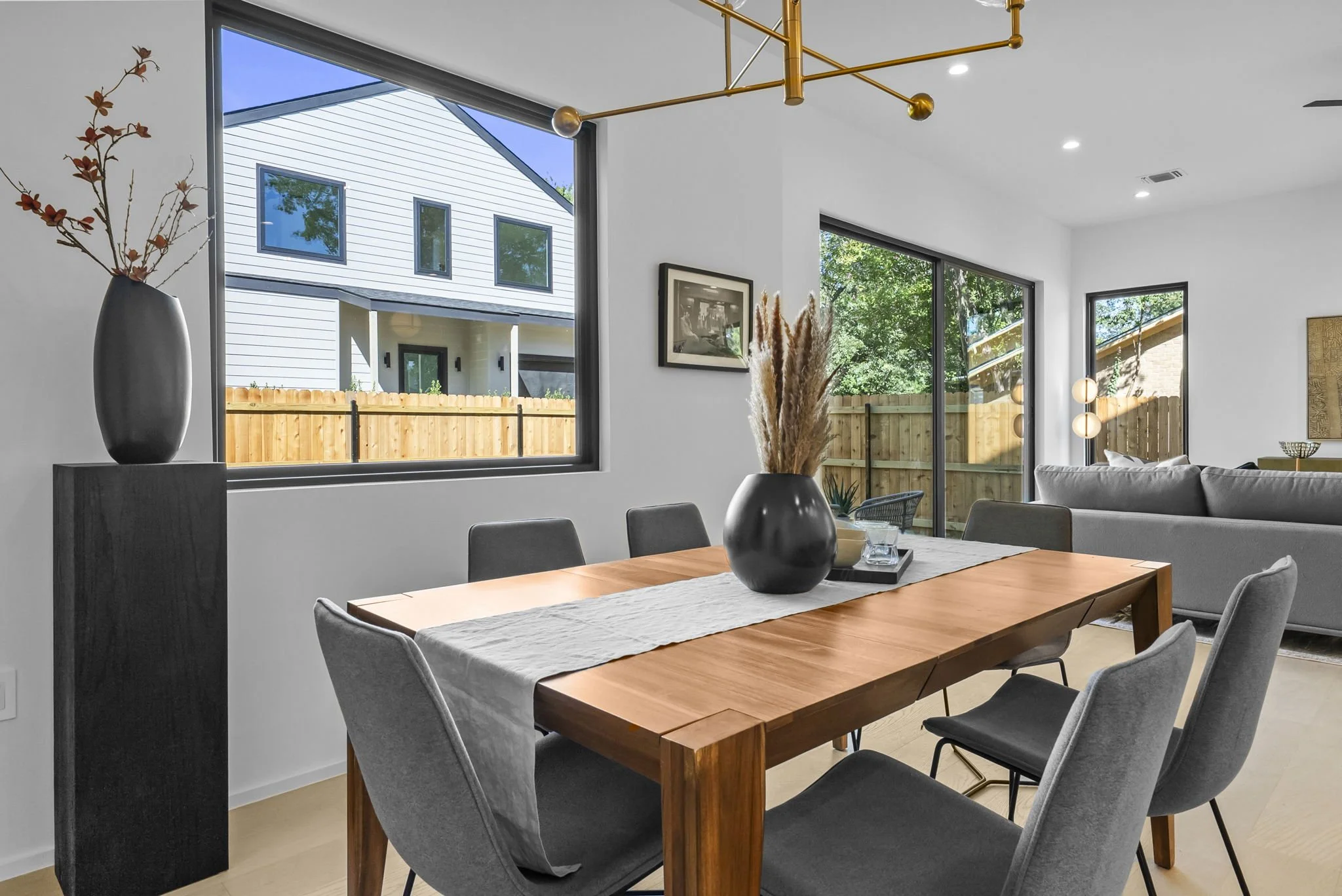 Dining area, living room all with abundant natural light