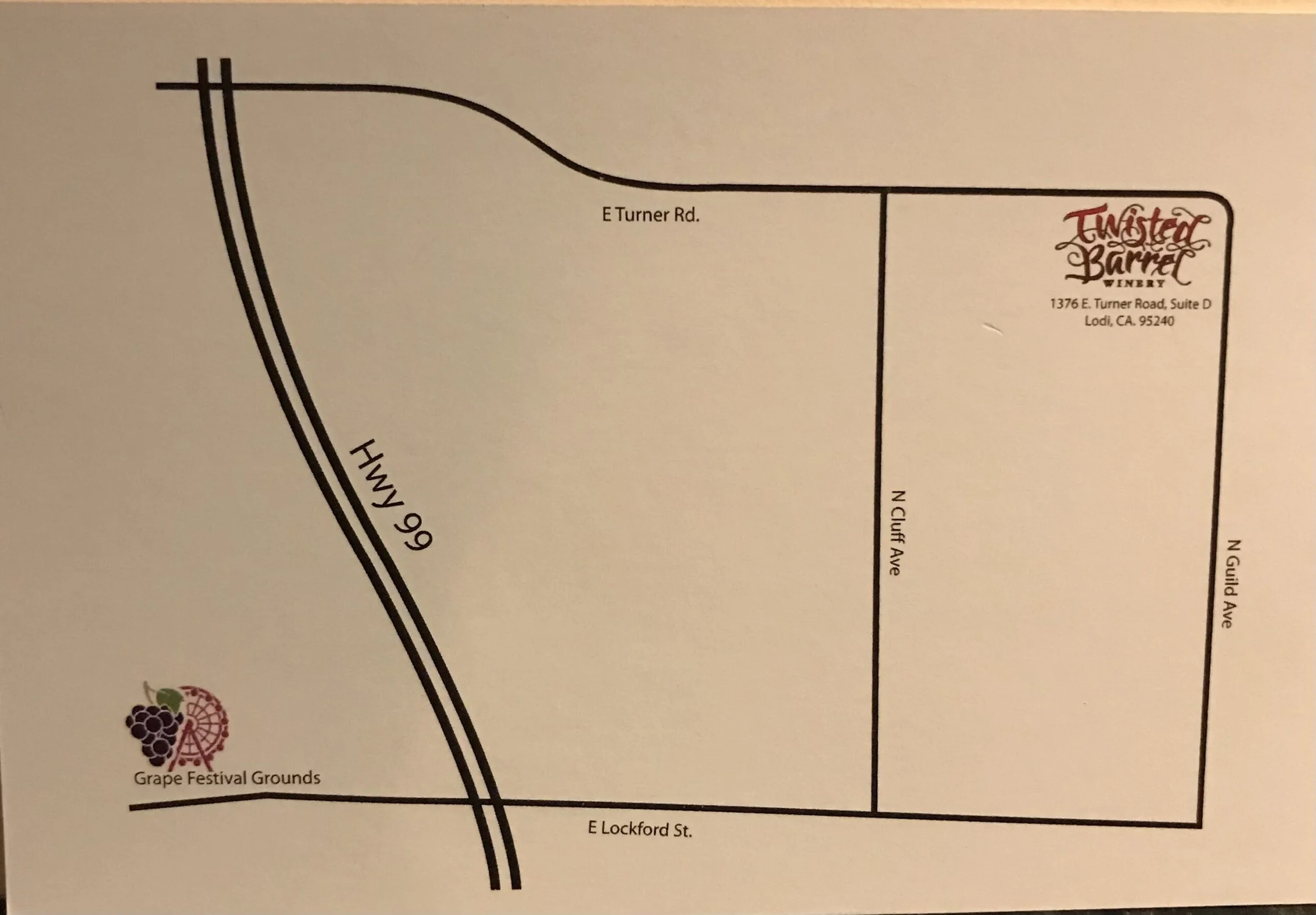 Map of Twisted Barrel Winery with street names including E Turner Rd, N Cluff Ave, N Guild Ave, and E Lockford St. The winery's address is 1376 E Turner Road, Suite D, Lodi, CA 95240, in the upper right corner. The Grape Festival Grounds are indicated in the lower left corner with a logo of grapes and a wheel.