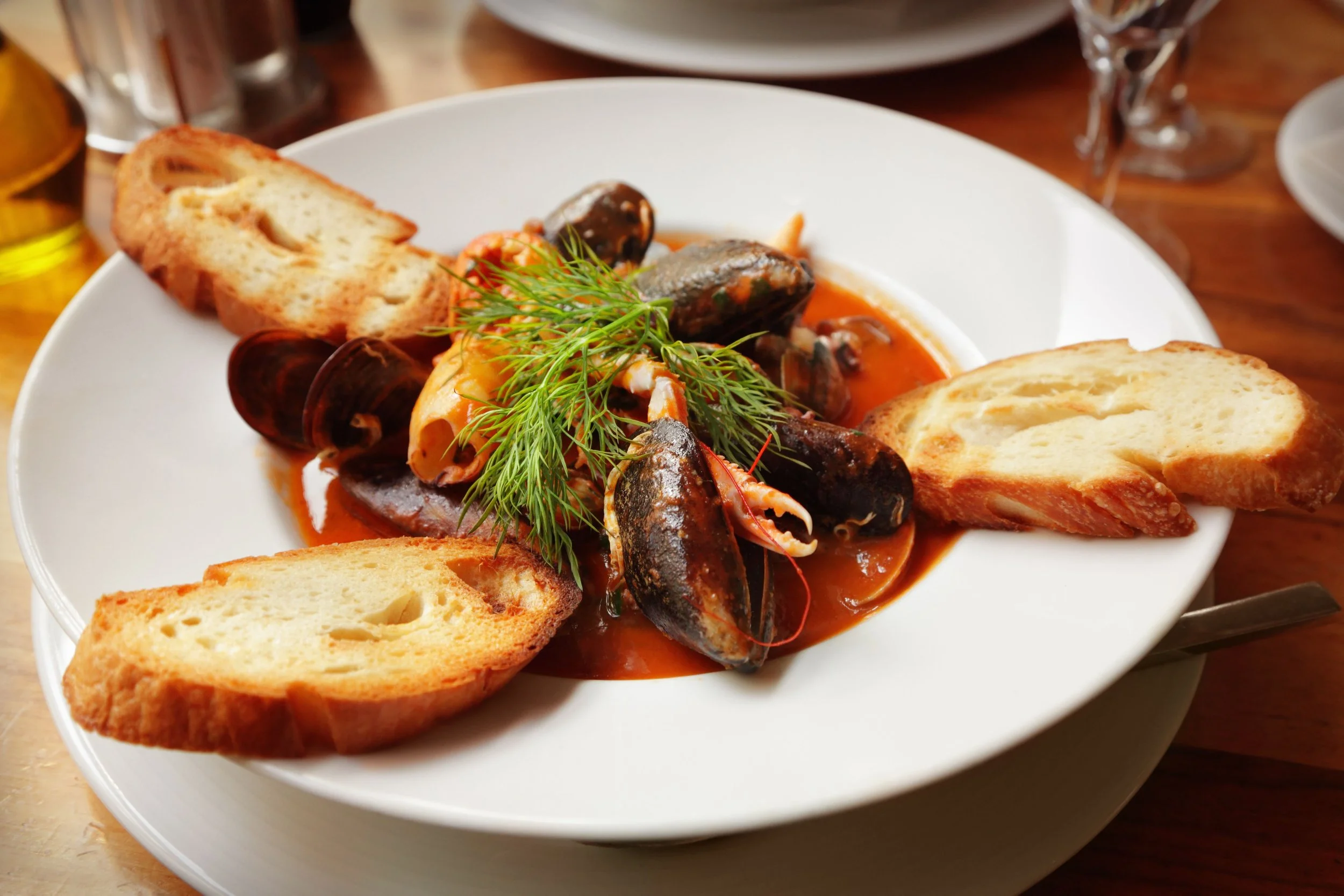 Bowl of Cioppino served with Italian Bread