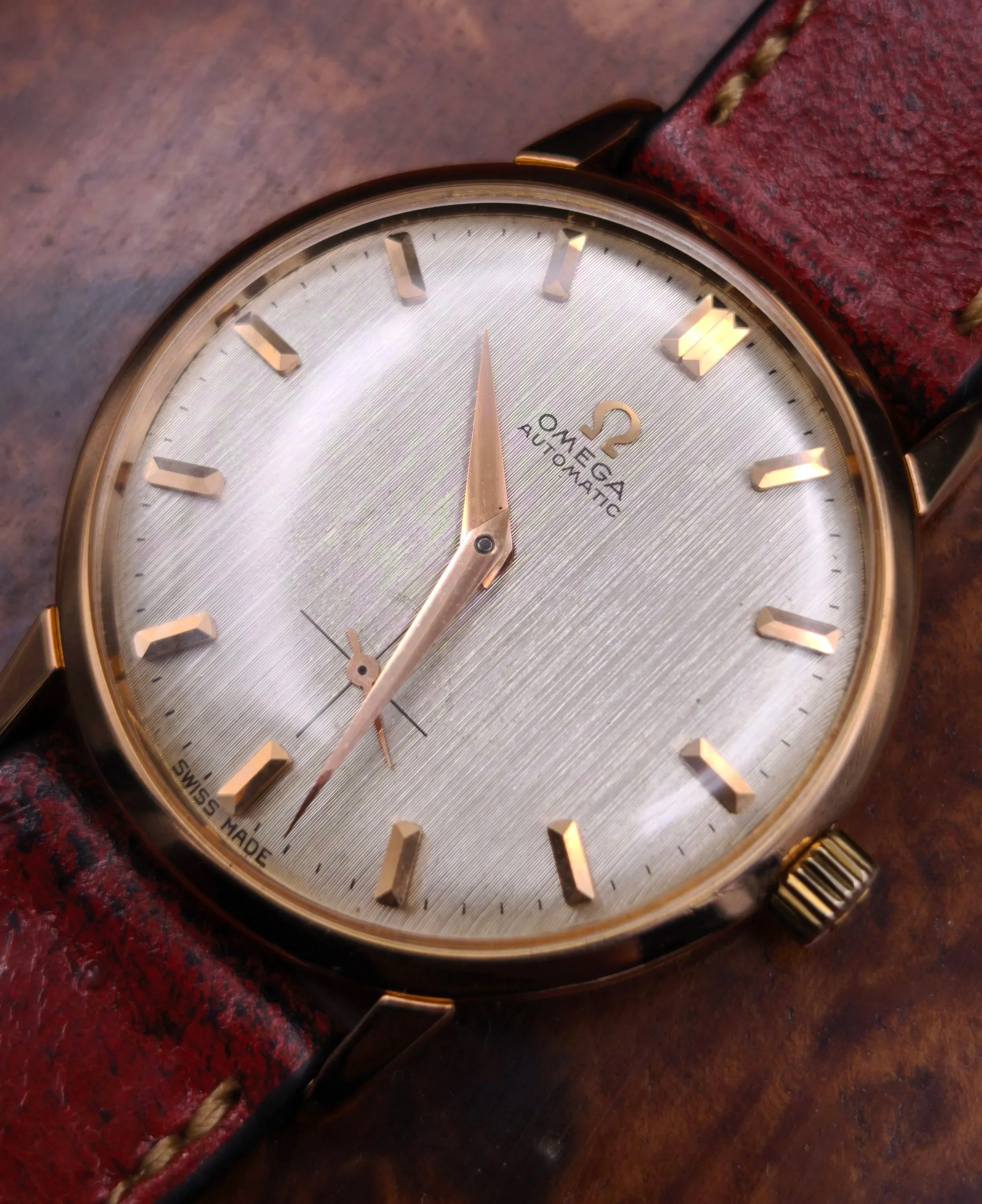 Circa 1960 18k Rose Gold Omega 2897 SC with linen dial.