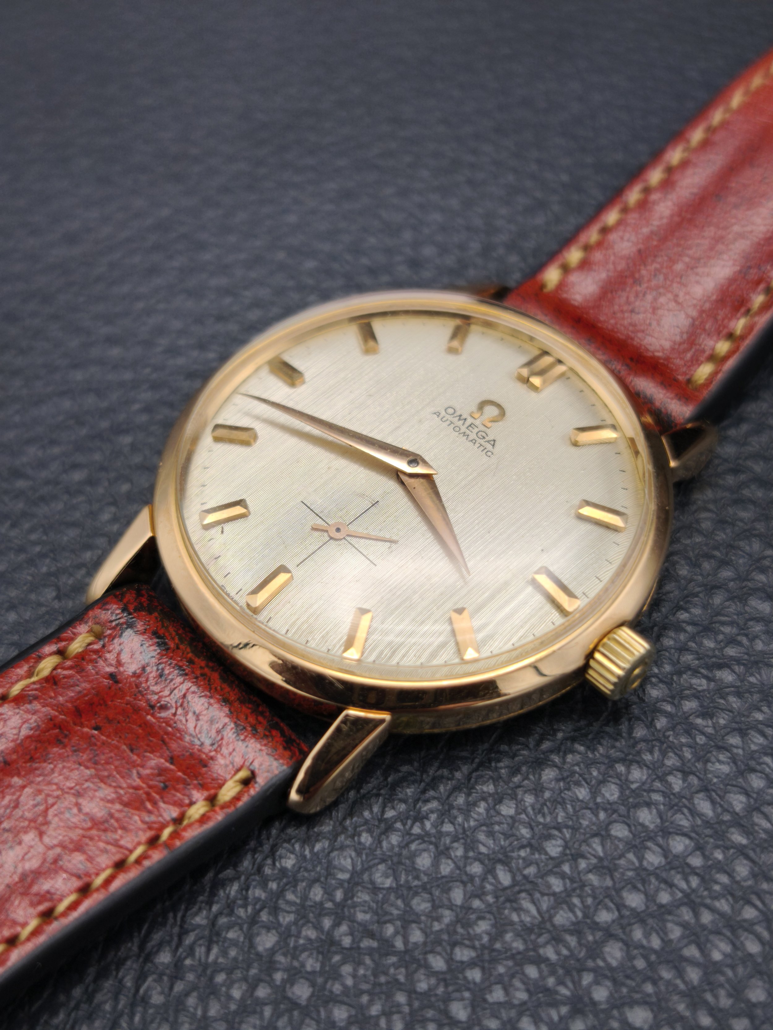 Omega ref: 2897 SC Linen Dial, Solid 18K Rose Gold Geneva Case, Circa 1960