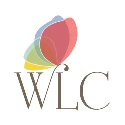 Colorful abstract flower with the letters WLC underneath