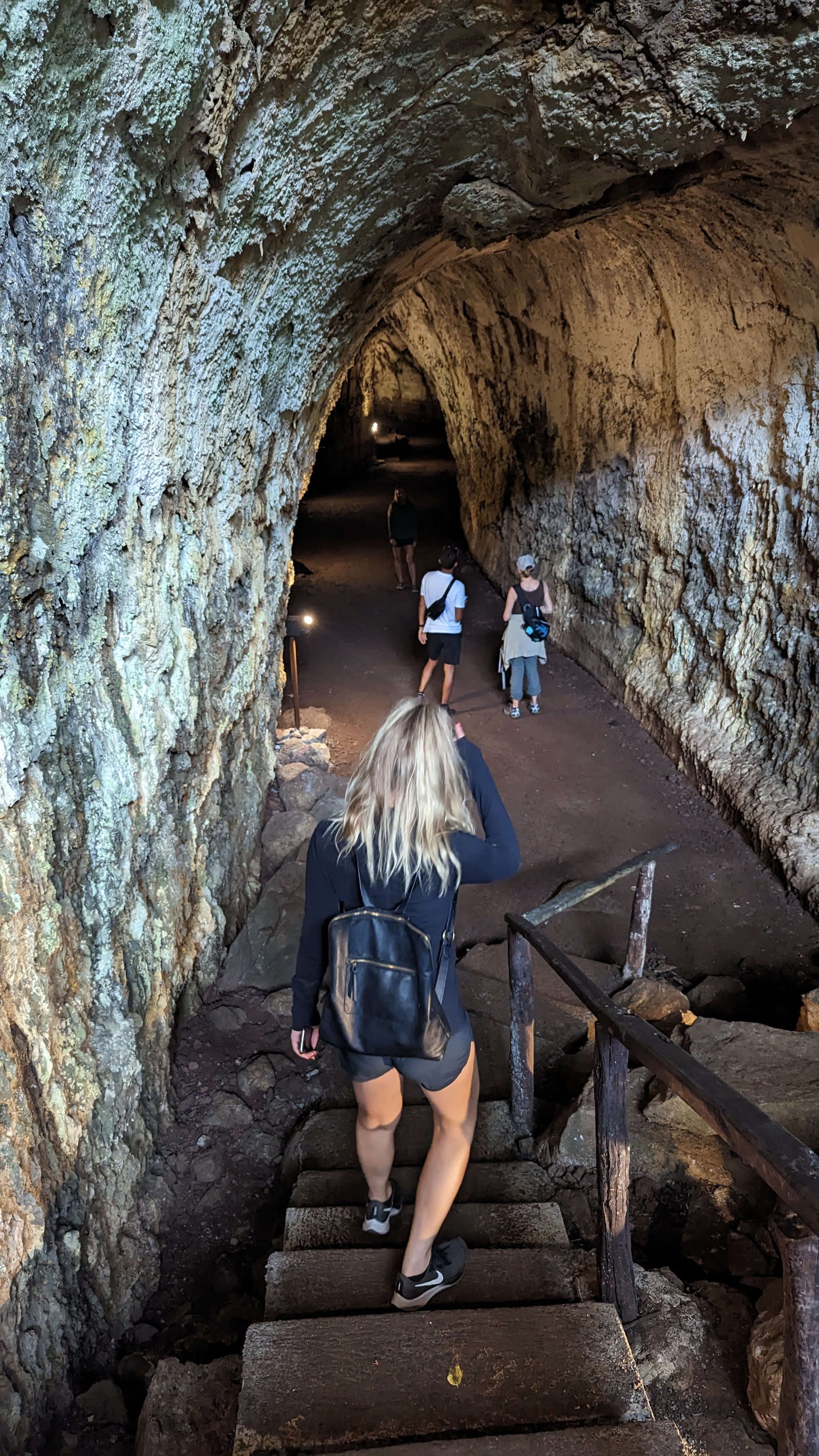 tourists-walking-through-lava-tunnel3.webp