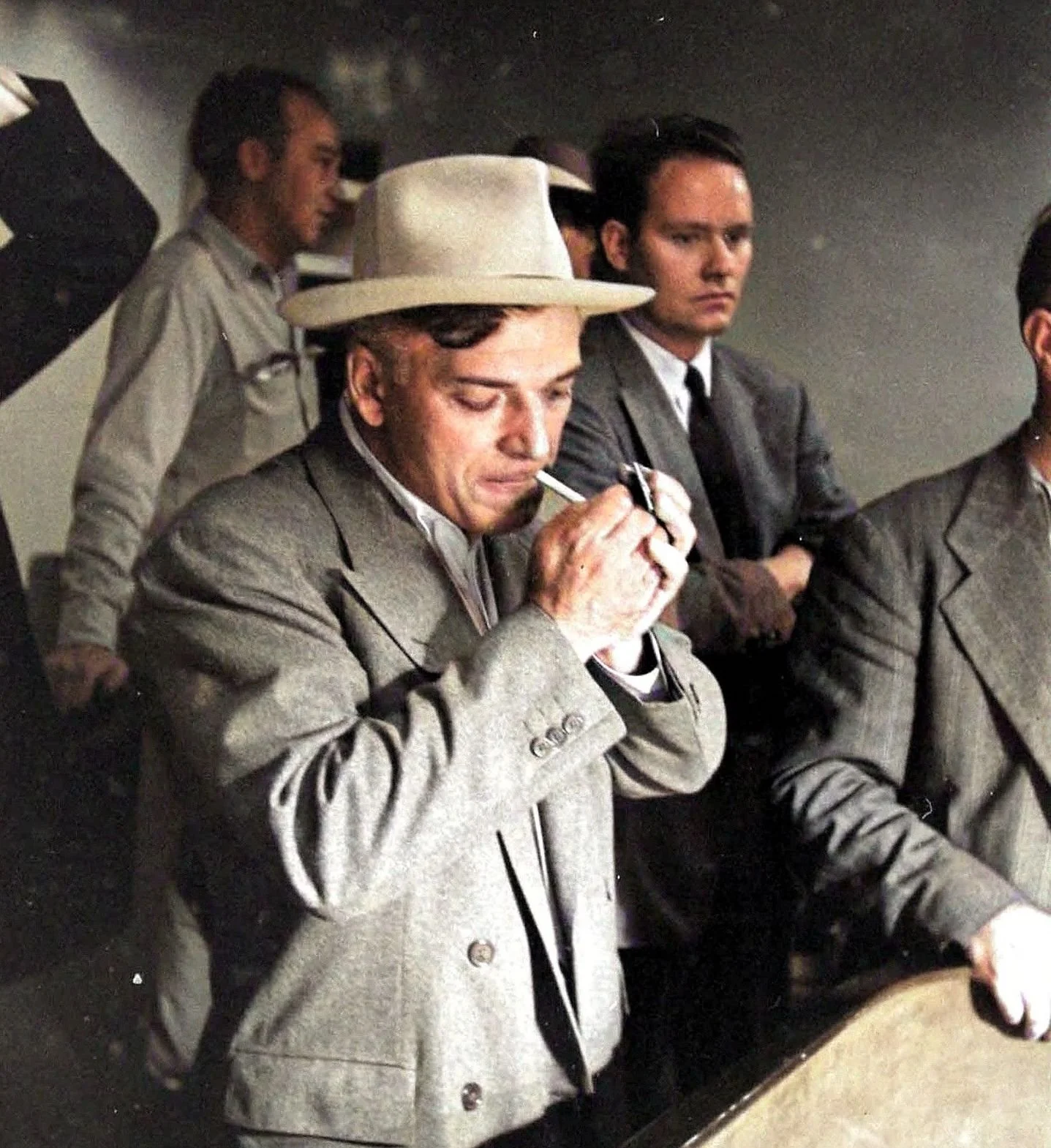 Tony Cornero, wearing his signature Royal Stetson hat, and firing up a smoke, aboard his last ill-fated gambling ship, the Lux