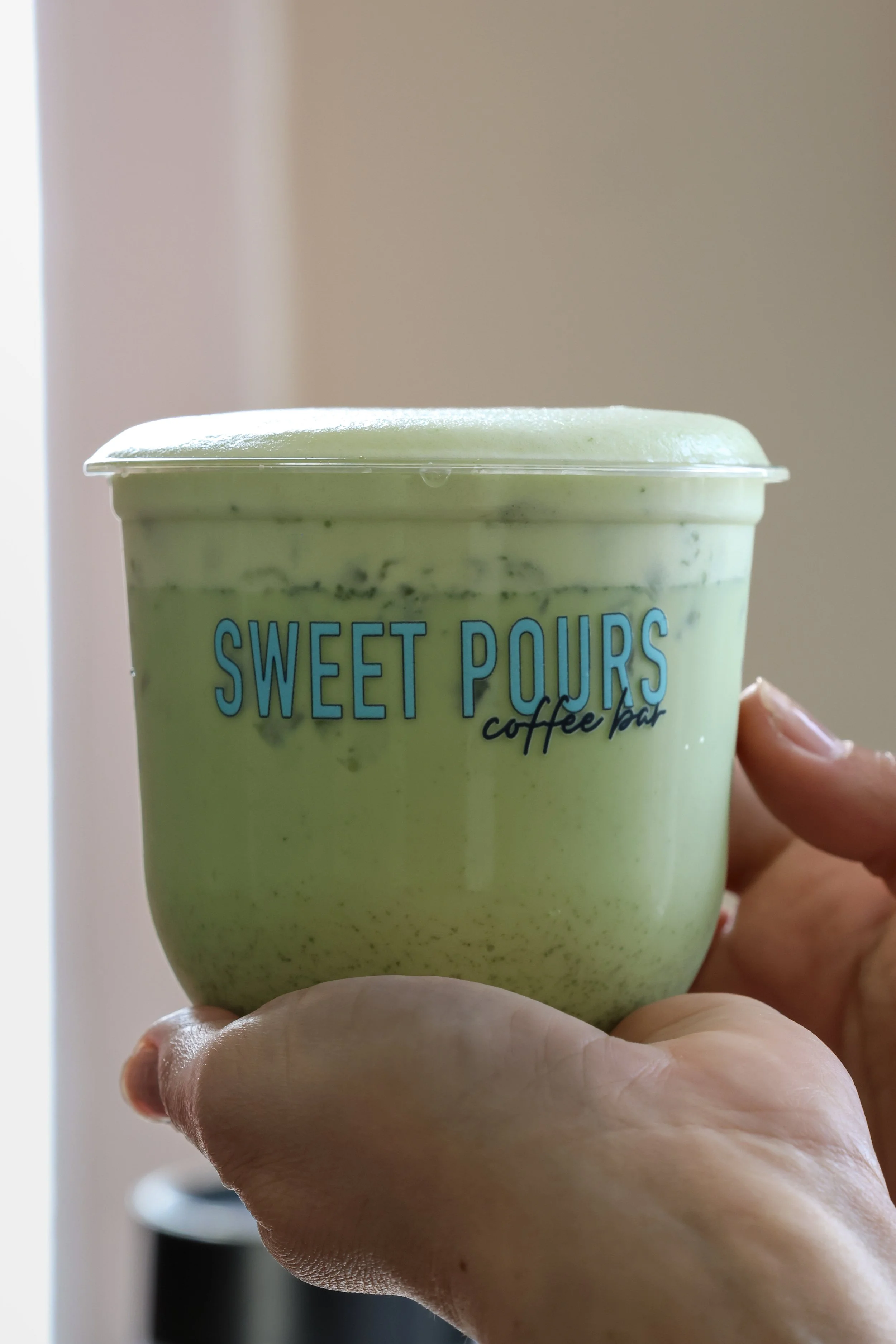 making a matcha latte for catering on a mobile coffee cart in Dallas, Texas.