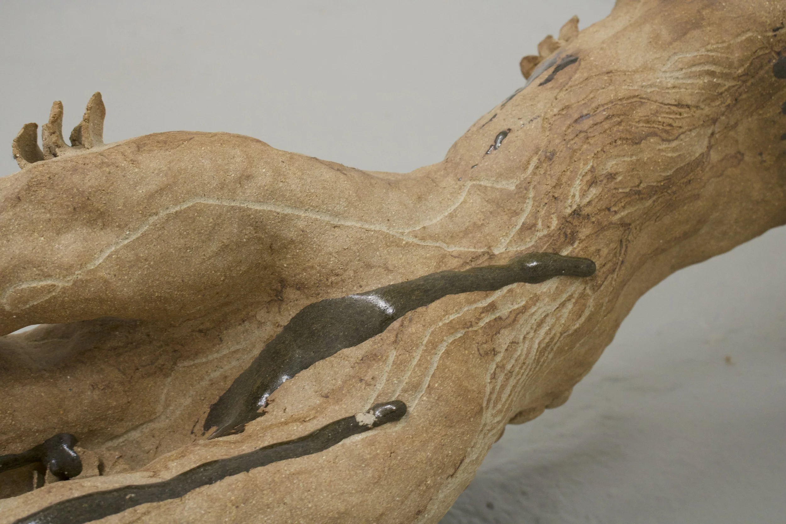 Reaching Out
(2025)
- Stoneware, glazed with found Chicago clay - 
50” x 13” x 19” 