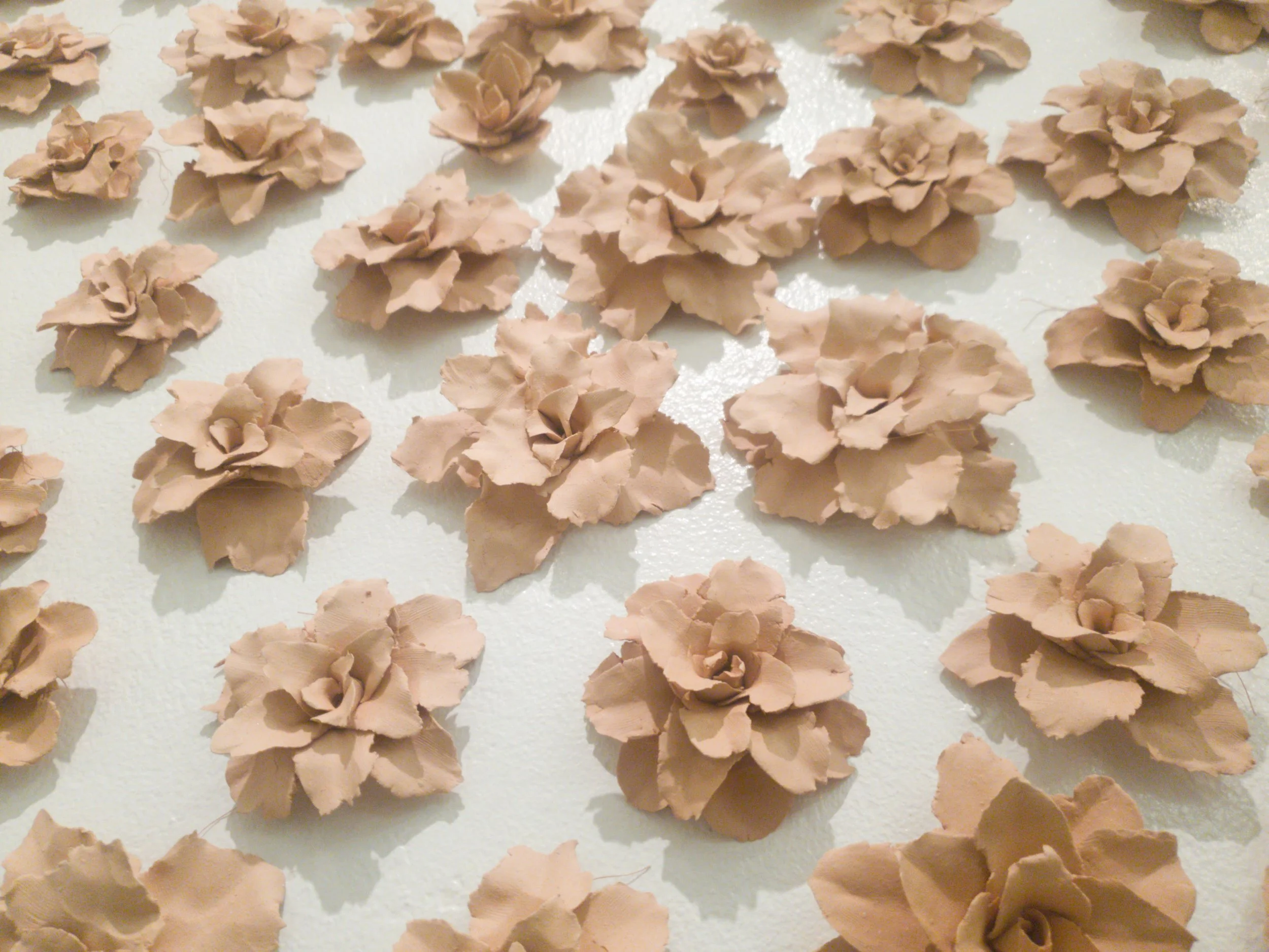 An Arrival
(2024)
- Bisqued Stoneware - 
9’ x 6’