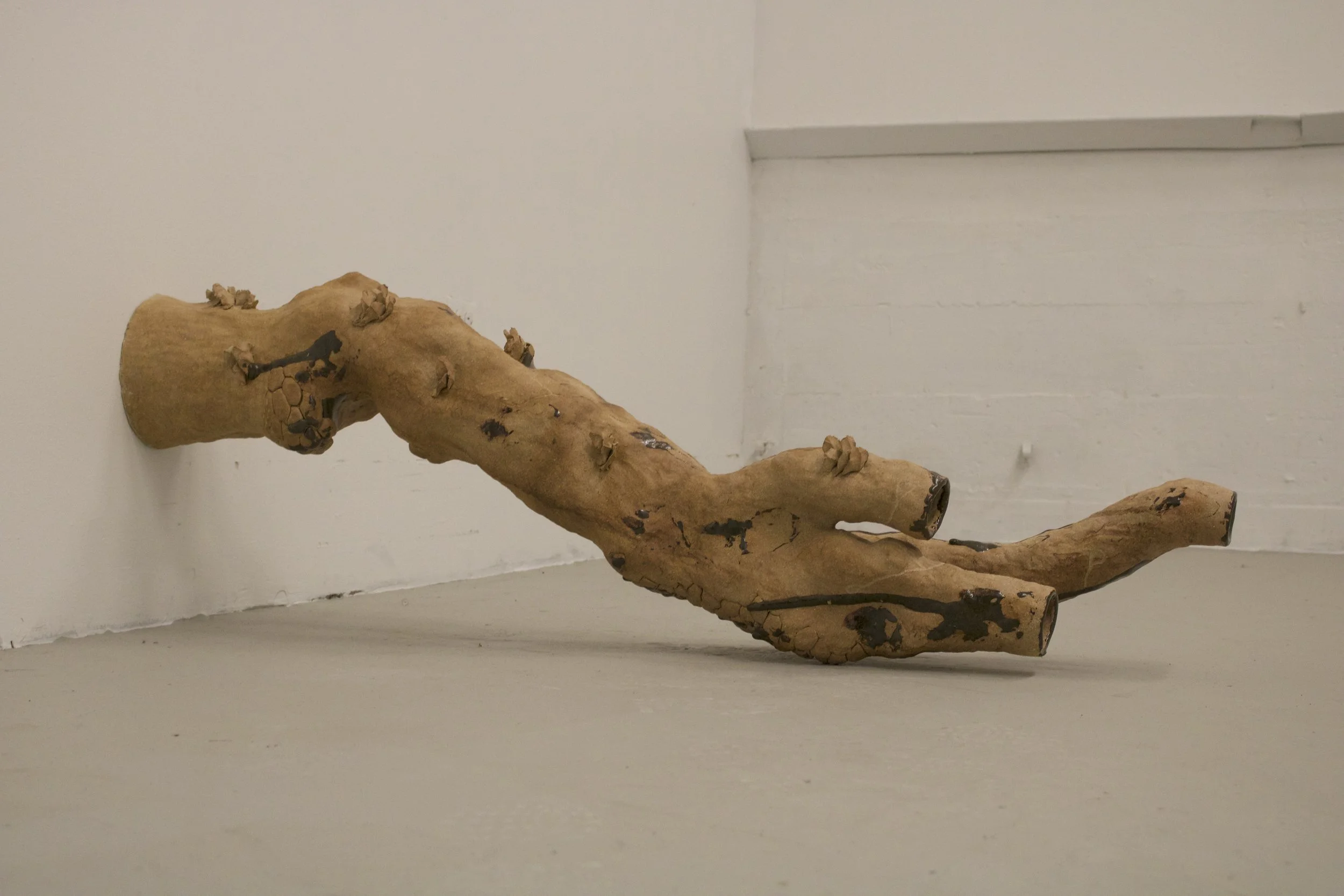 Reaching Out
(2025)
- Stoneware, glazed with found Chicago clay - 
50” x 13” x 19” 