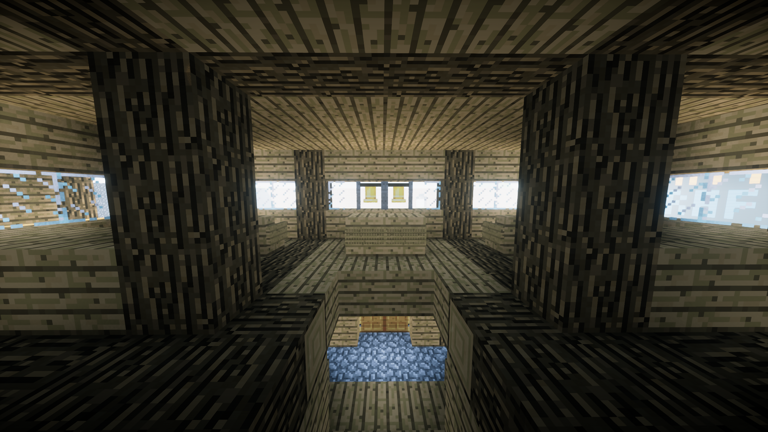 Interior view of a wooden house in Minecraft, showing a level with windows and a staircase.