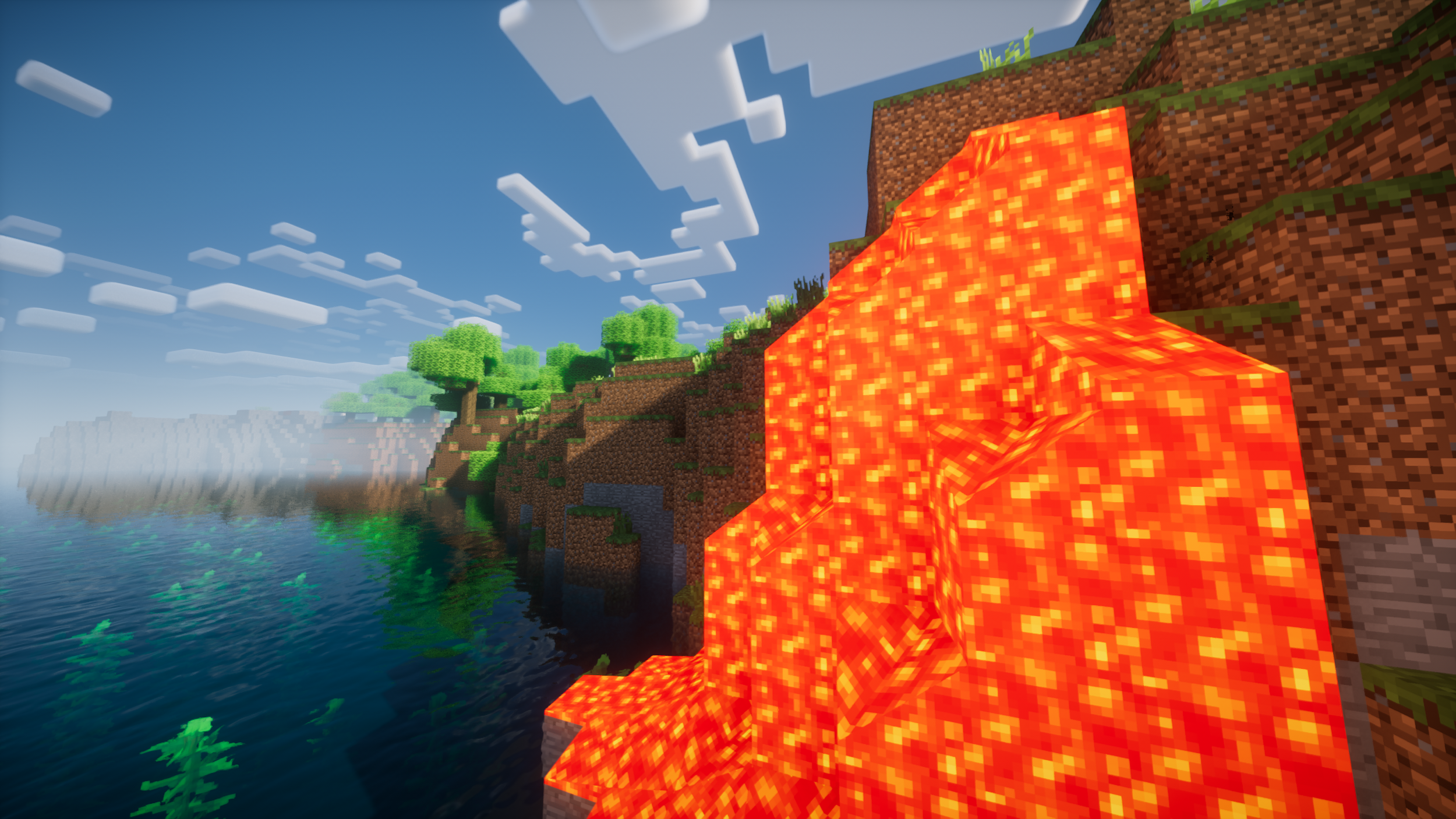 Minecraft image of a volcanic lava flow on a hillside near a body of water with green vegetation and trees, under a partly cloudy sky.
