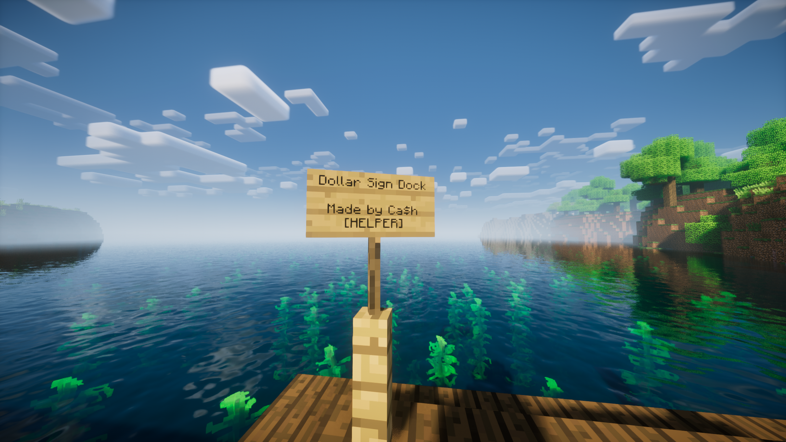 A Minecraft scene showing a wooden dock with a sign that reads 'Dollar Sign Dock Made by Cash [CHELFER]'. The dock is surrounded by water with a few submerged plants. In the background, there are trees to the right and a distant foggy shoreline under a blue sky with blocky clouds.