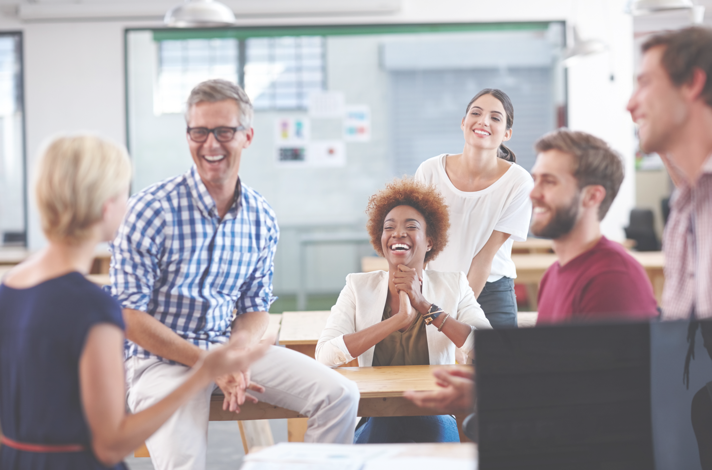 employees participating in workshops and training
