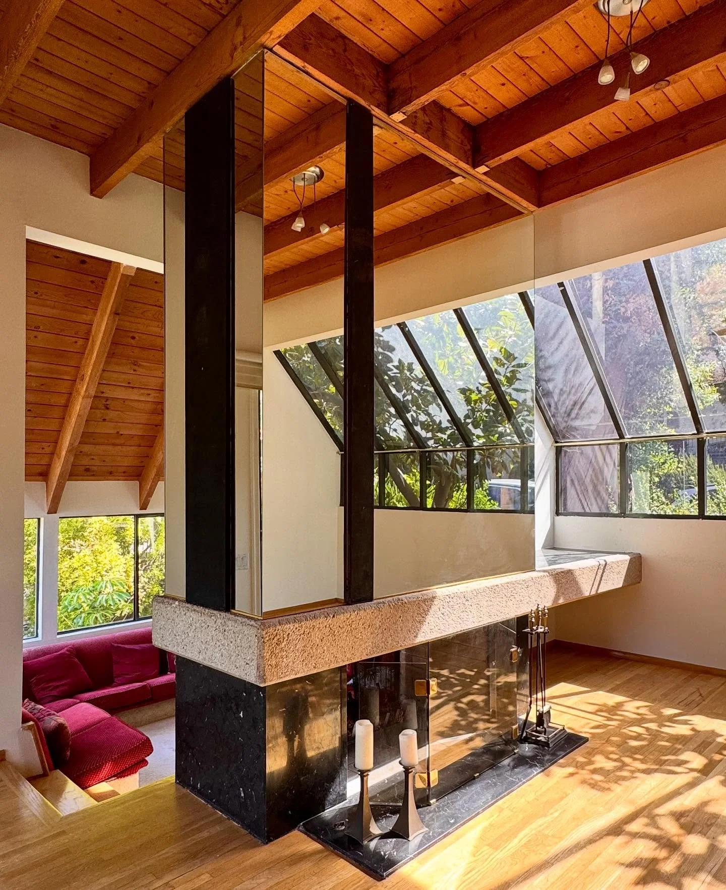 🍂 Chevy Chase Canyon in the 80s

✔️ All I have ever wanted is a conversation pit ❤️ This one is made better with a double-sided fireplace, mirrored walls and wood beam ceiling  ✔️ Bronze front door, multiple decks + skylights = loads of natural ligh