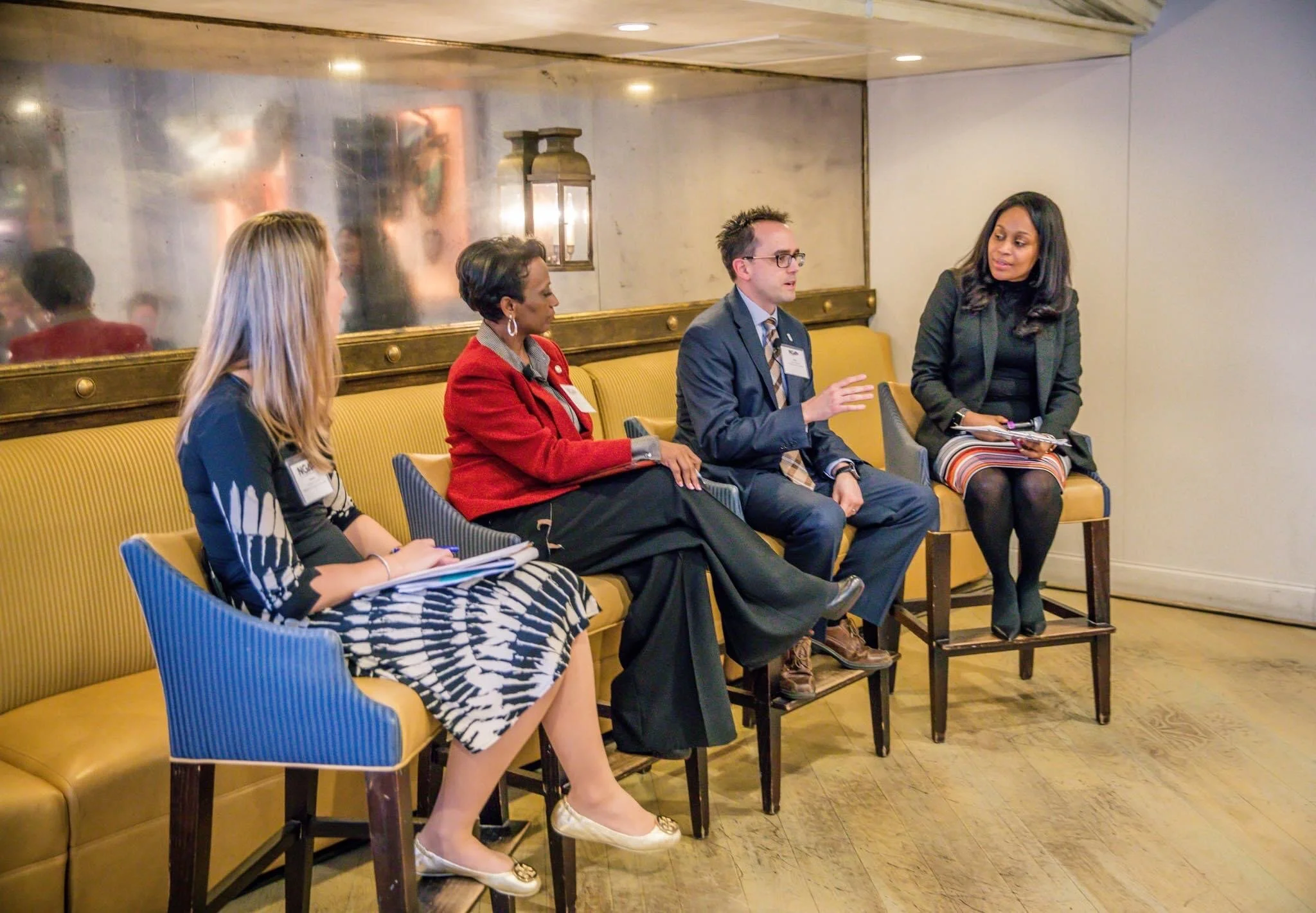Dr. Samuel with former Governors' advisors (L to R) Lindsay Dworkin, Dietra Trent, and Brian Mitchell at a summit on governors' post-election priorities in 2018.