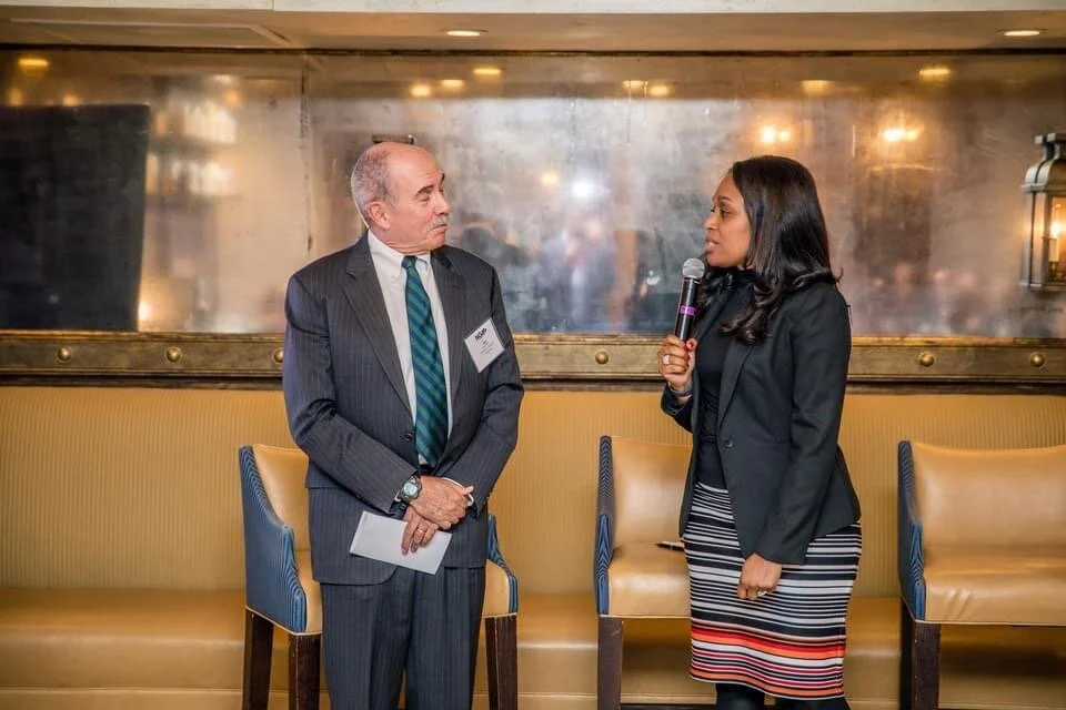 Dr. Samuel introducing Gov. Bob Wise at the 2018 Post Elections Summit.