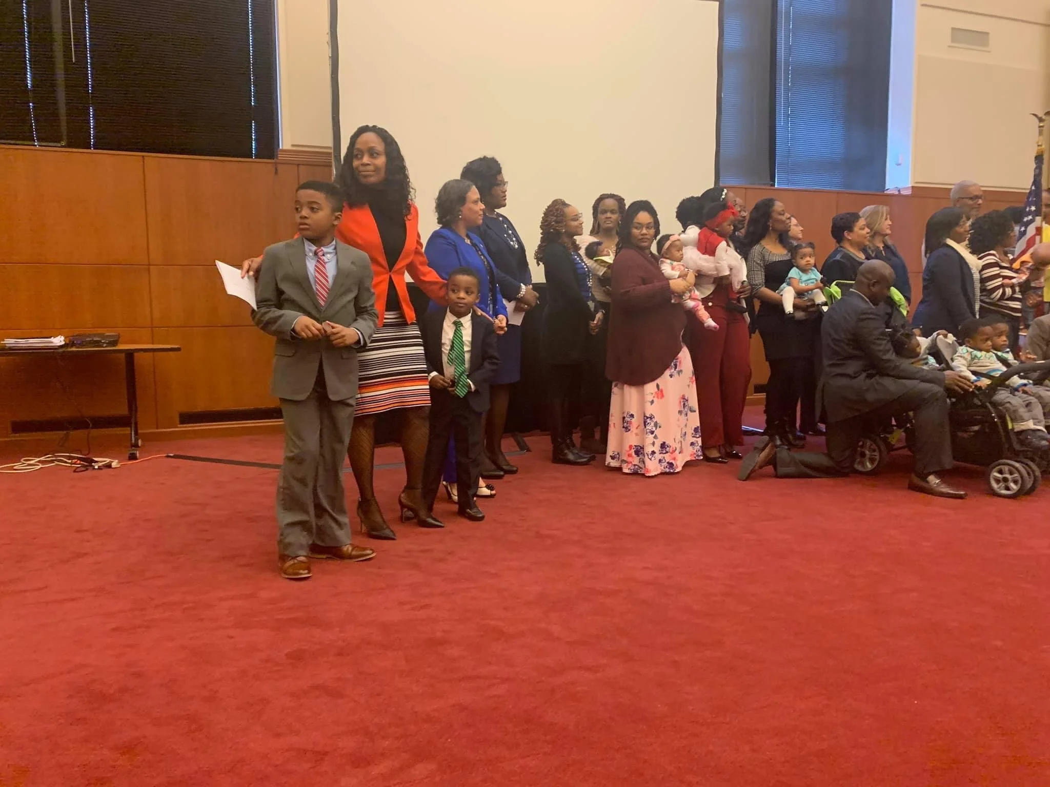 Dr. Samuel and her children attending her presentation for VA Governor Ralph Northam on racial disparities and maternal mortality.