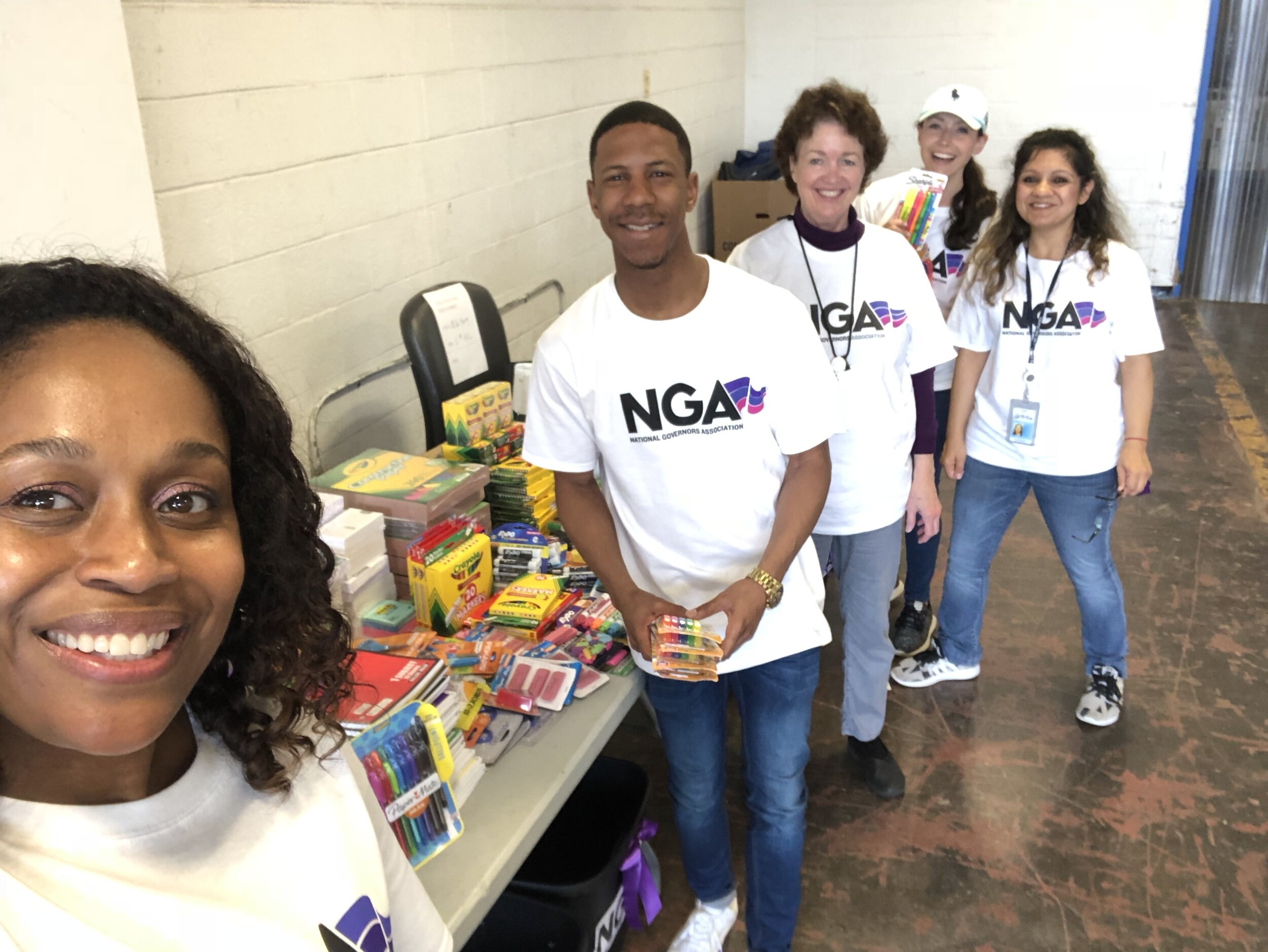 Dr. Samuel with other NGA staff at a giving event in Washington, D.C.