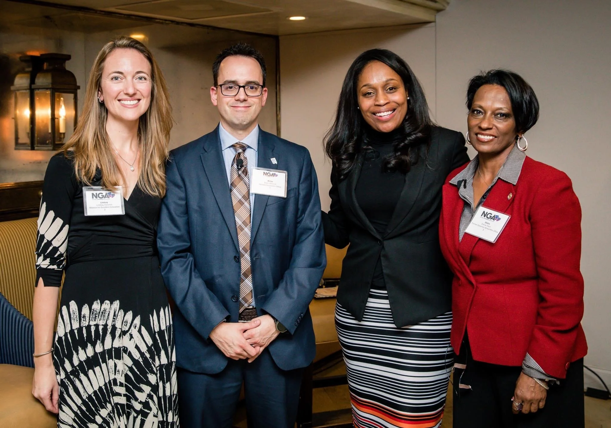 Dr. Samuel with former Governors' advisors (L to R) Lindsay Dworkin, Brian Mitchell, and Dr. Dietra Trent