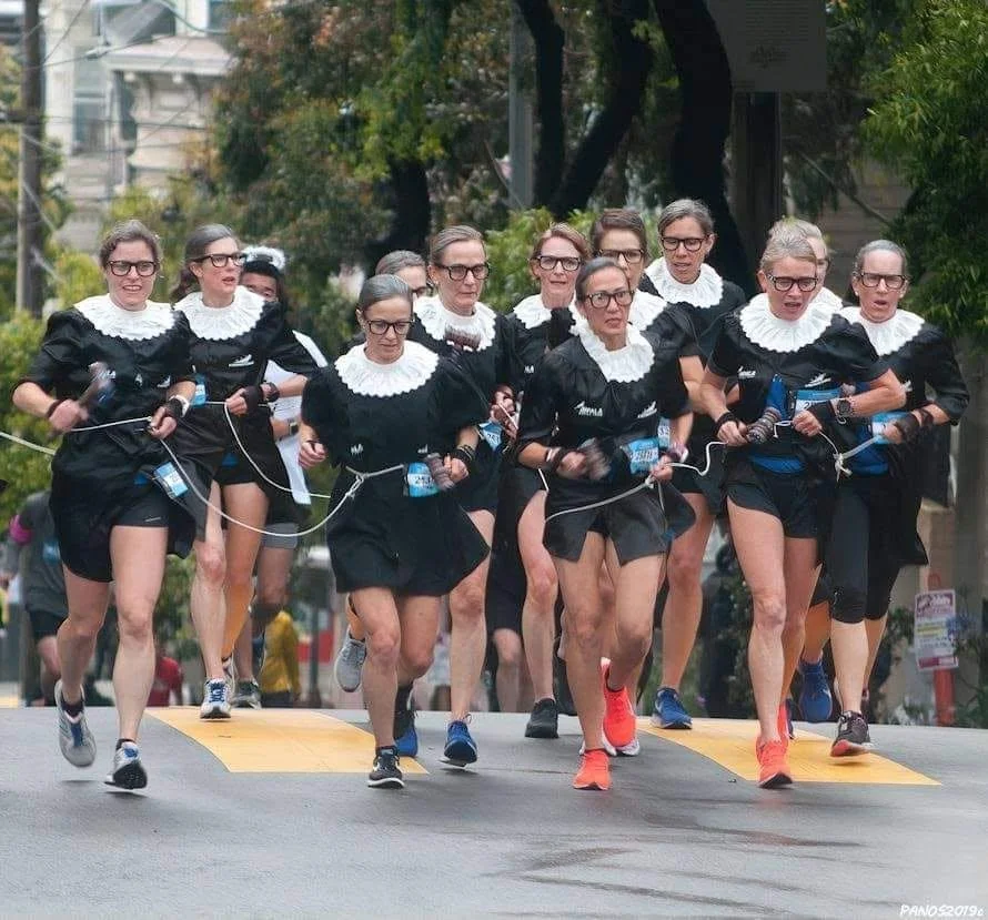 Runners dressed as Justice Ruth Bader Ginsburg at the 2019 Bay to Breakers in San Francisco.