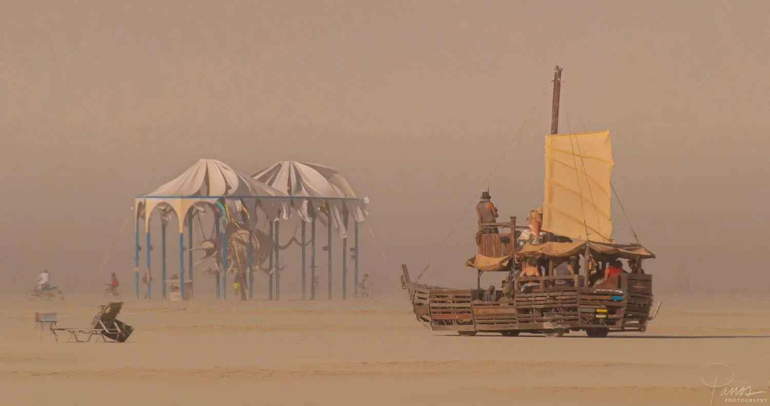 Wooden sailing ship Mutant Vehicle travels across the playa at Burning Man 2013.