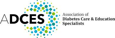 Logo for the Association of Diabetes Care & Education Specialists (ADCES) with black text and a colorful dotted design.