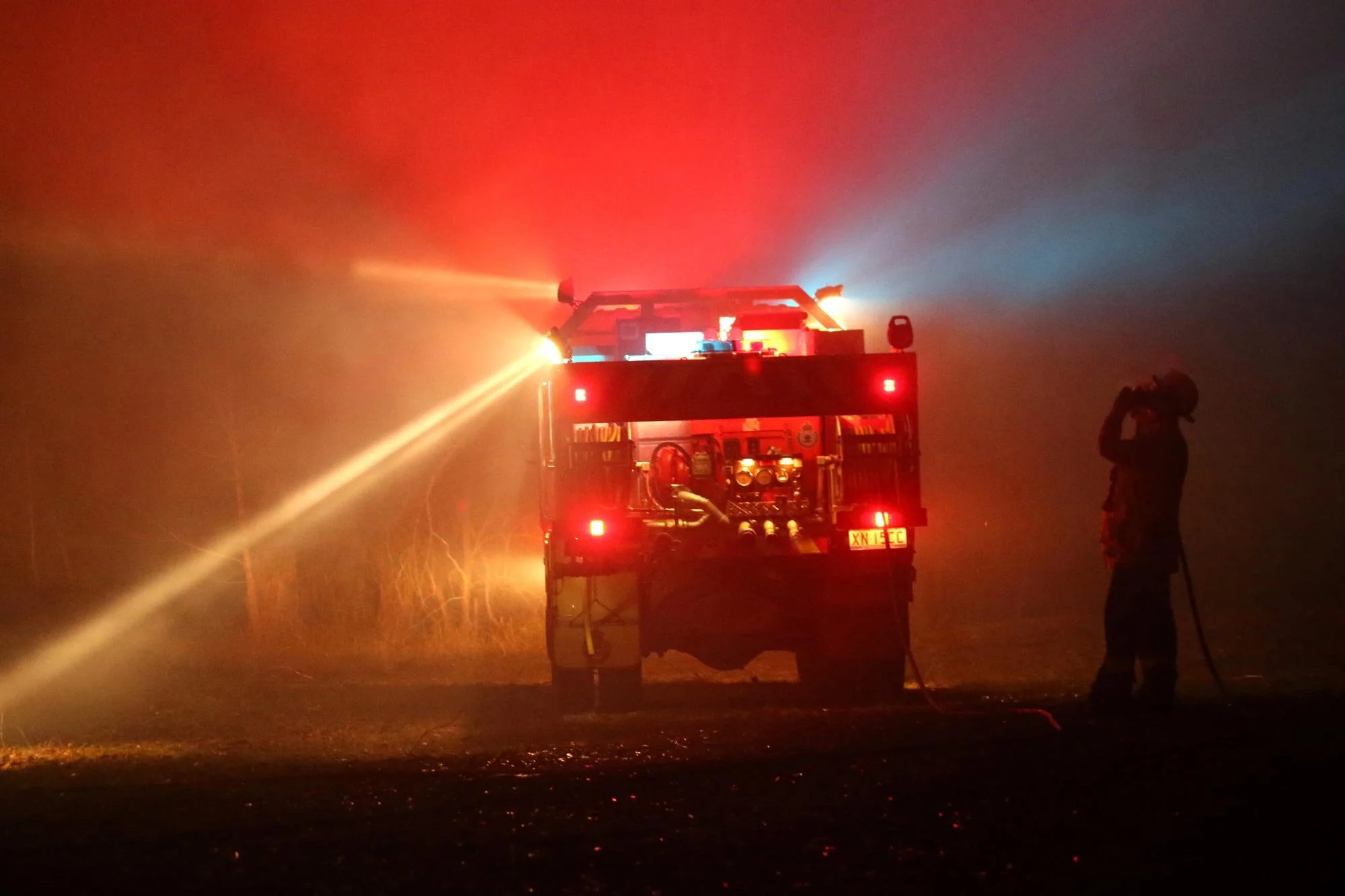  Horsley Park RFS Crew. Horsley Park RFS crew defend a property near Potato Point on NSW South Coast.   Thursday 23rd January 2020. Guardian Australia. 