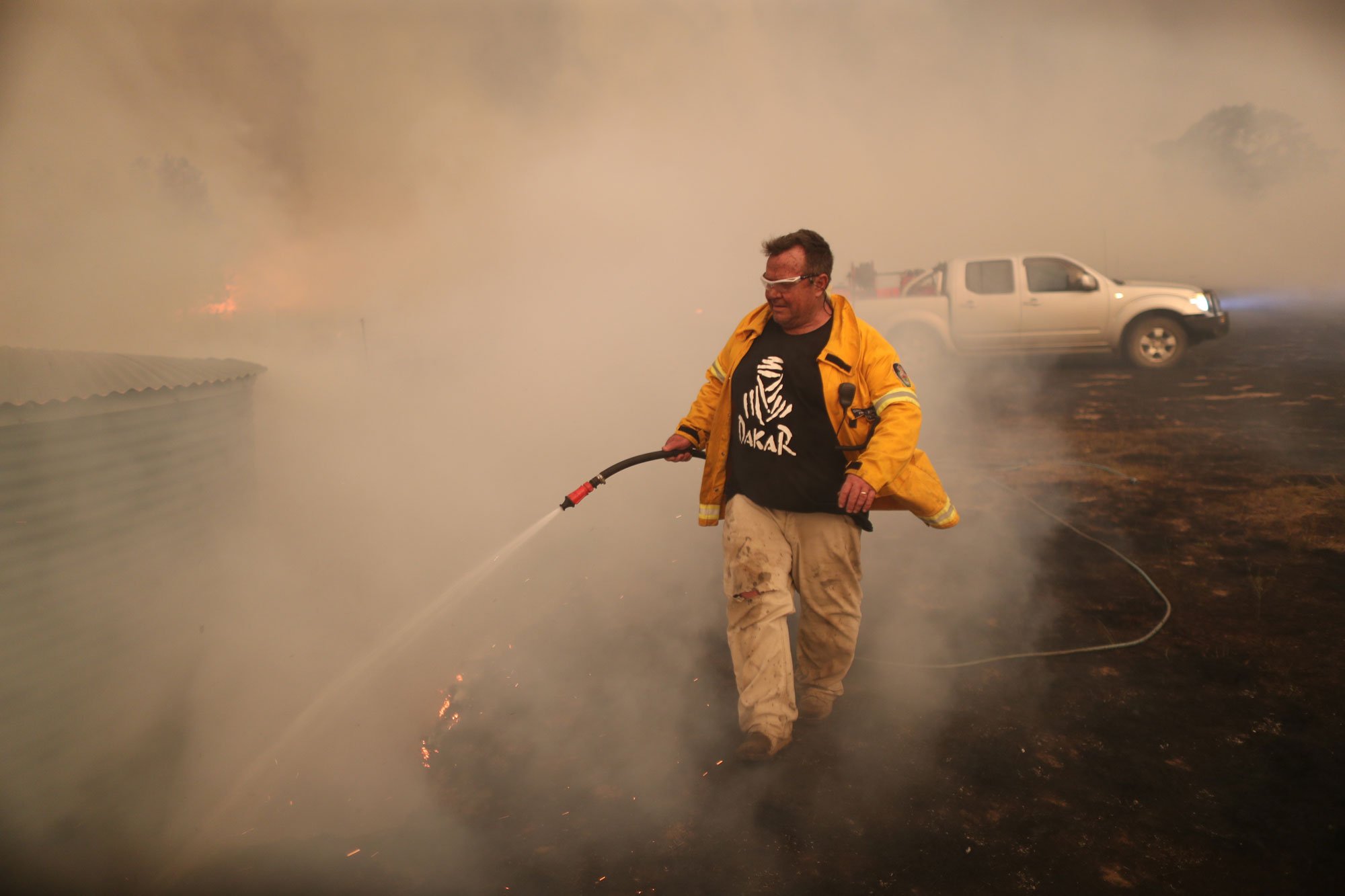 Laurence Cowie fights fire on Tallabrook lodge a property along the Bumbalong Road North of Bredbo.   Saturday 1st February 2020. Guardian Australia. 