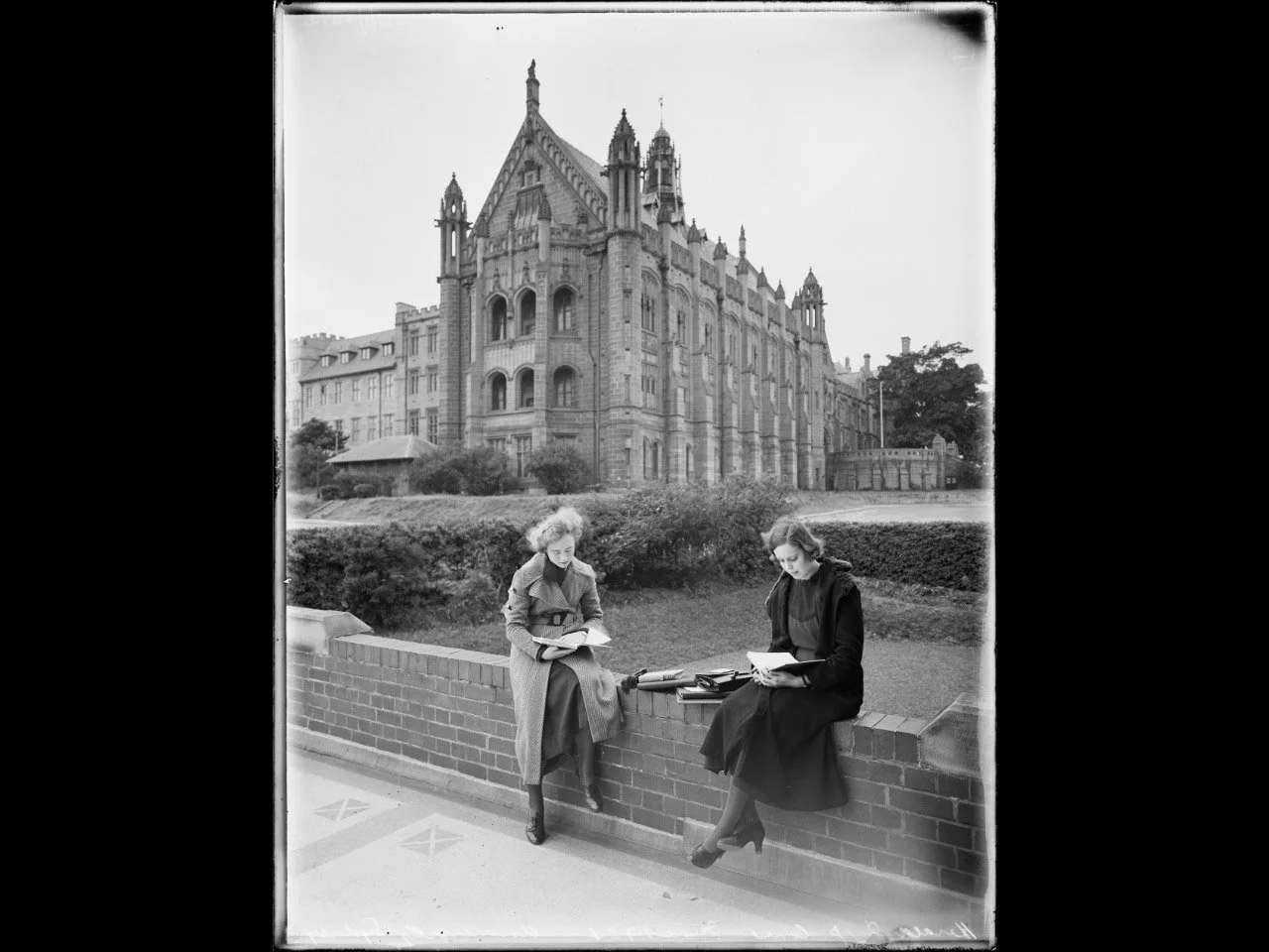 Fairfax Corporation, Two female students studying in the grounds at Sydney University, Sydney, June 1934, nla.gov.au/nla.obj-163384894