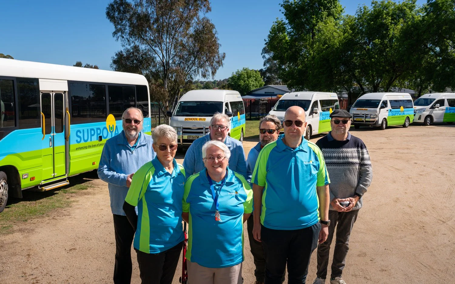 Suppoya bus fleet and drivers in Bathurst.jpg