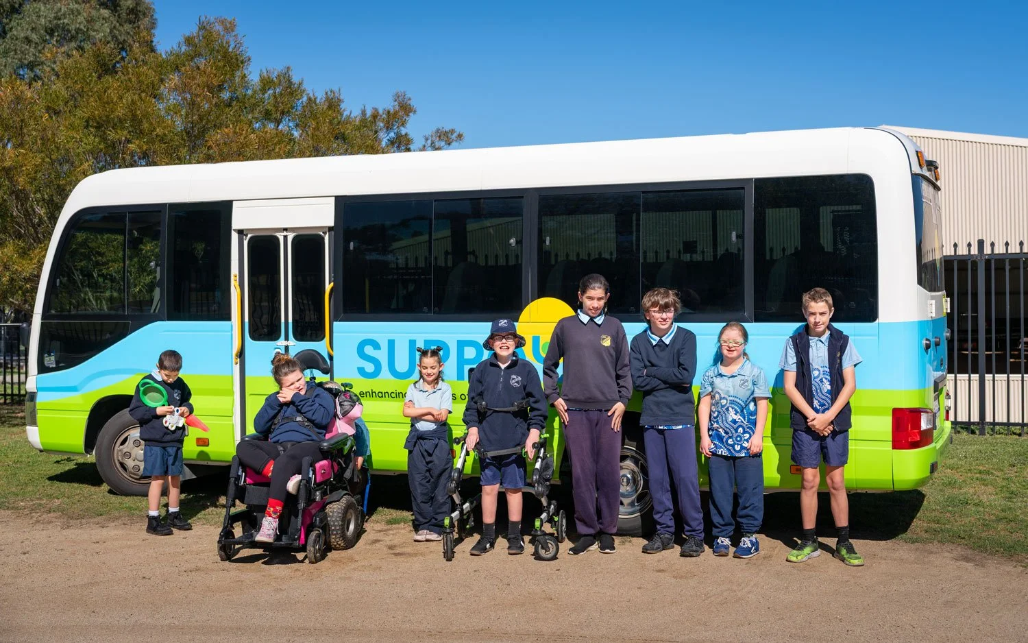 Students next to their Suppoya bus in Bathurst.jpg