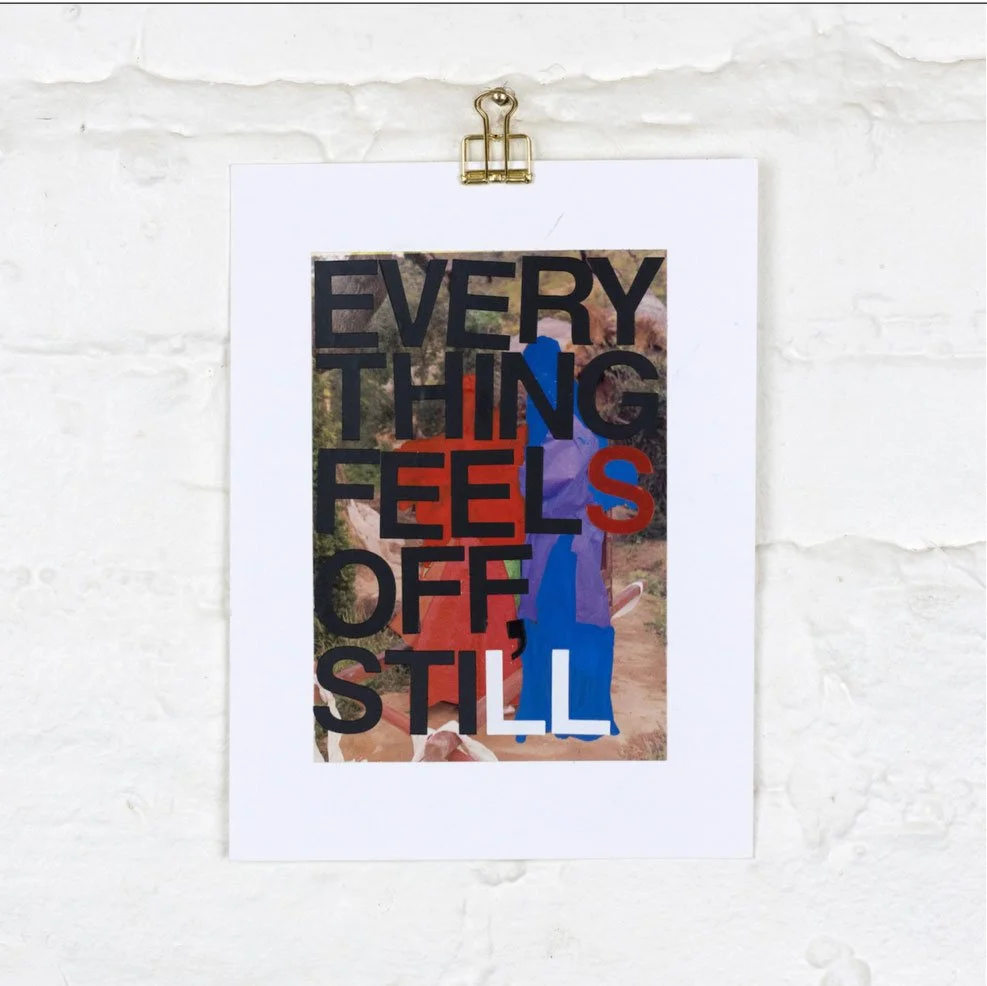 Artwork clipped to a wall reads "Everything feels off, still" in all capitals on a collaged background.
