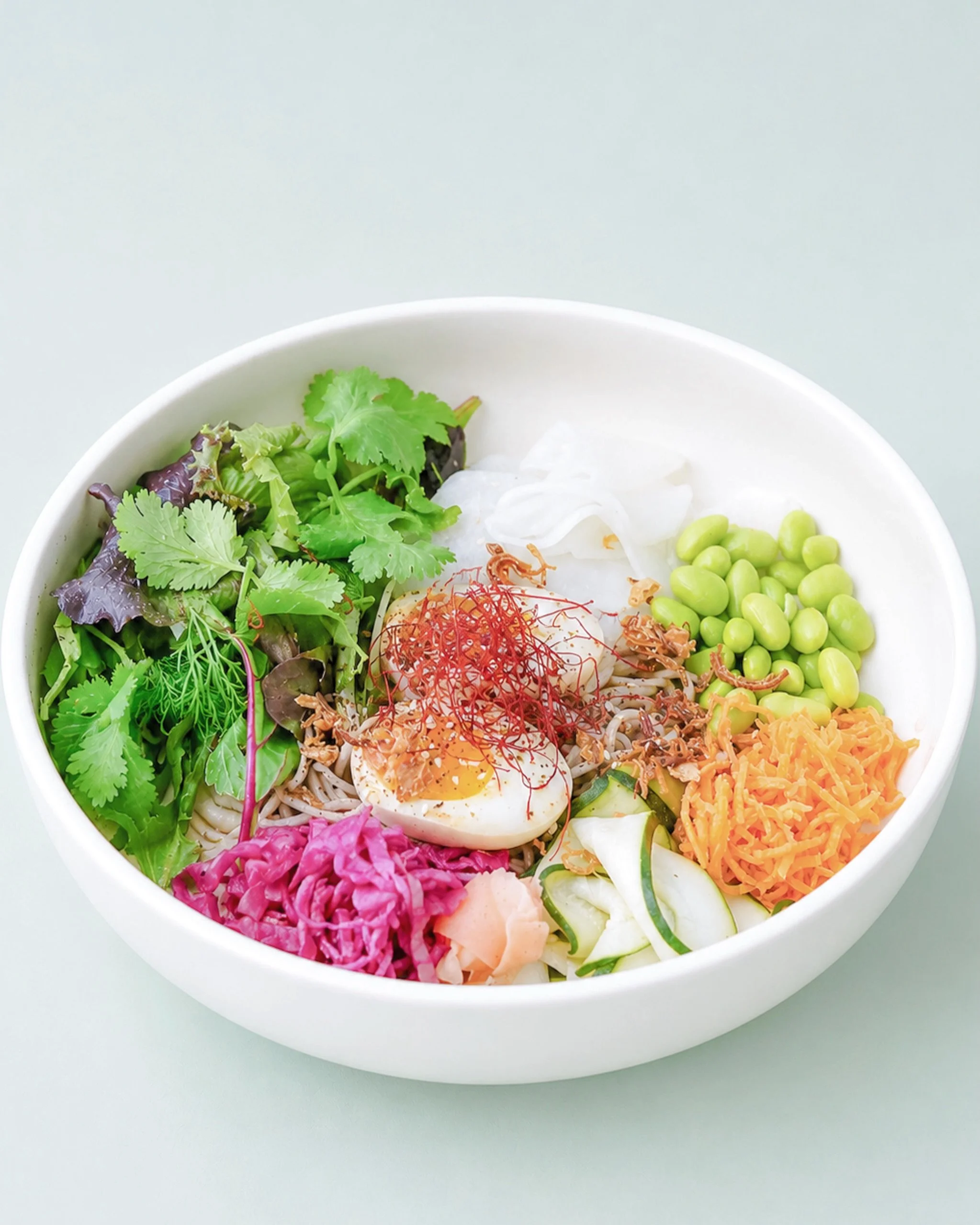 Fresh, light, and actually filling 🥢 Our soba noodle salad comes with mixed greens, edamame, pickles, and a soy cured egg for the perfect savoury finish. 

#dayocafe #sobanoodles #asiancuisine #tweedheads #goldcoastfood