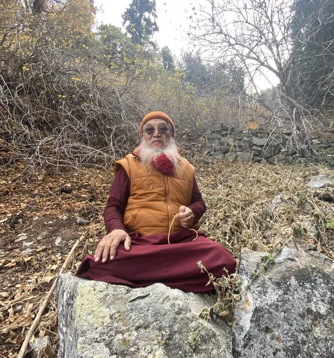 GKR Seated on Rock PD.jpg