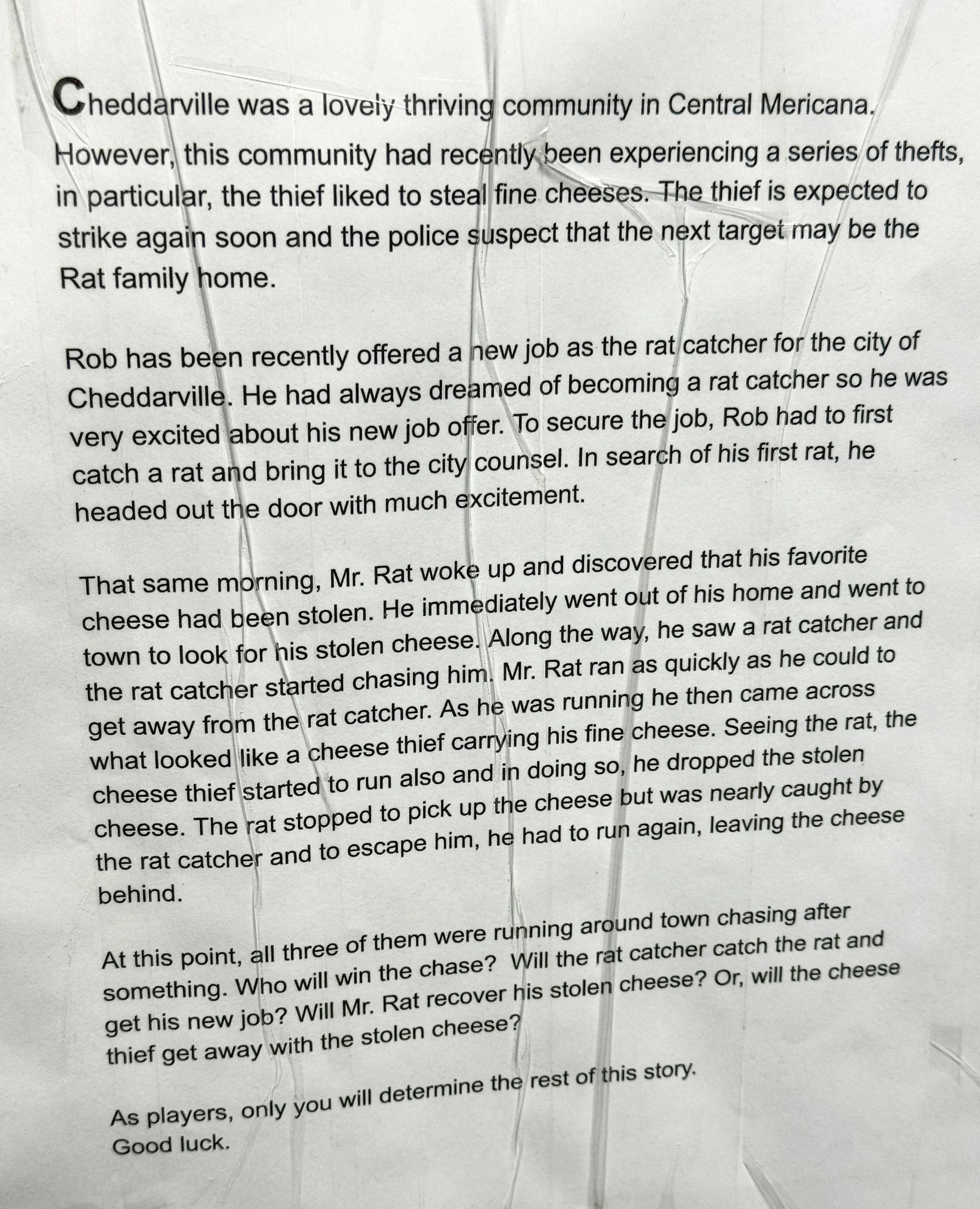 A crumpled printed story or article on white paper with black text, with multiple vertical and horizontal tears.
