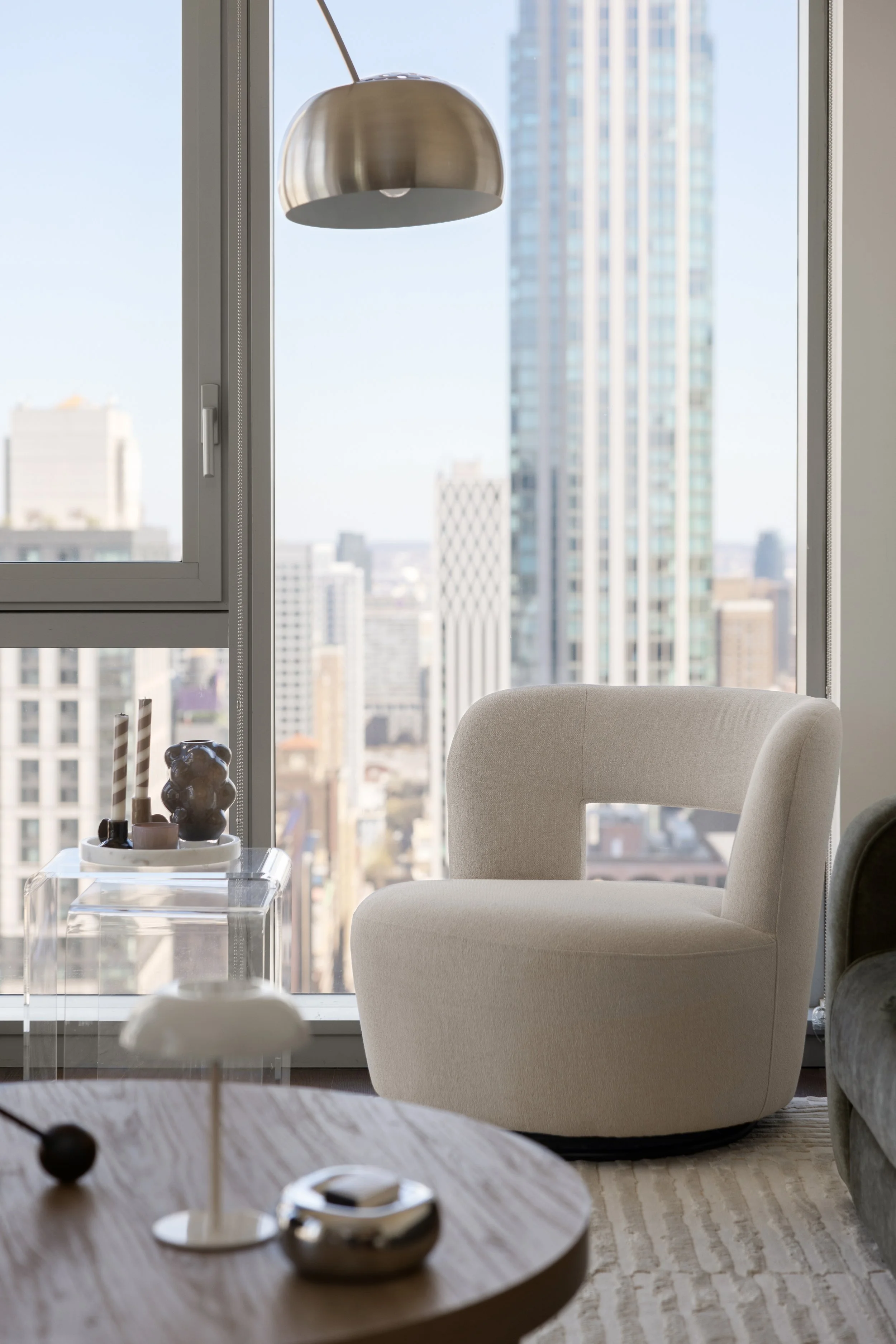 Luxury apartment in NoMad featuring open-concept living, oversized windows, and sophisticated modern finishes