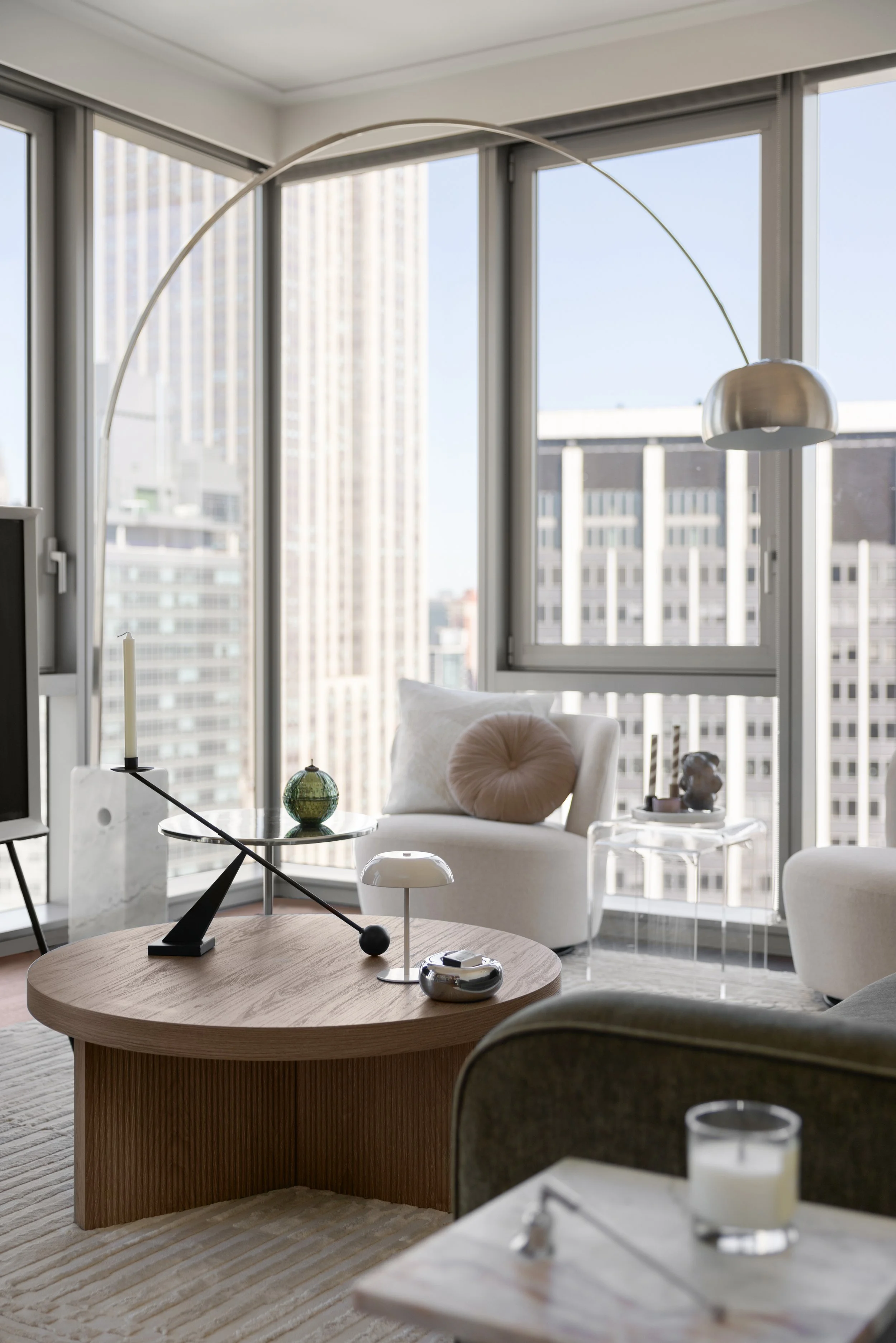 Contemporary NoMad residence with sculptural furniture, natural light, and elevated interior design details