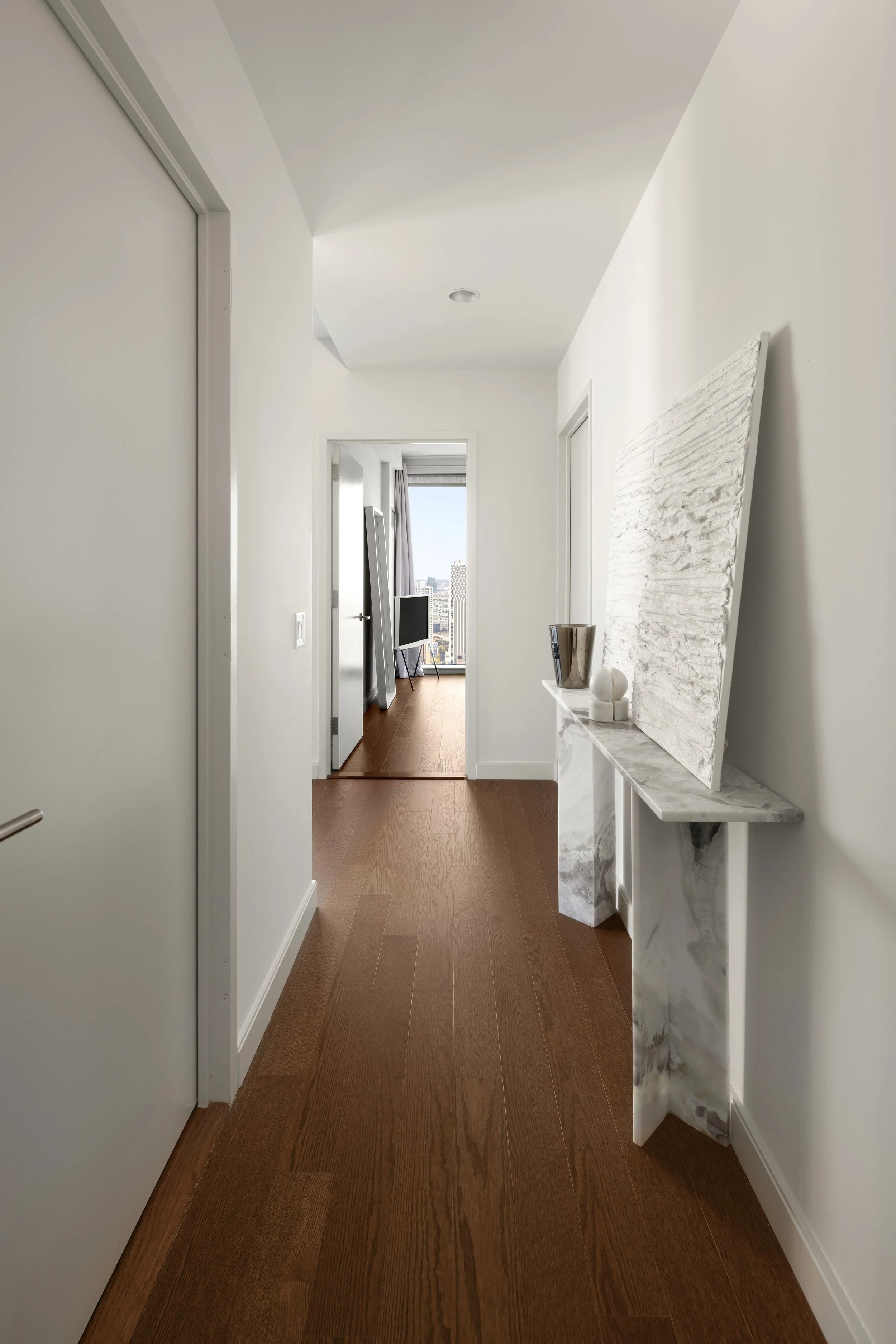 Modern NoMad apartment with custom marbel  consule, contemporary styling designed by Sonia Serrouya