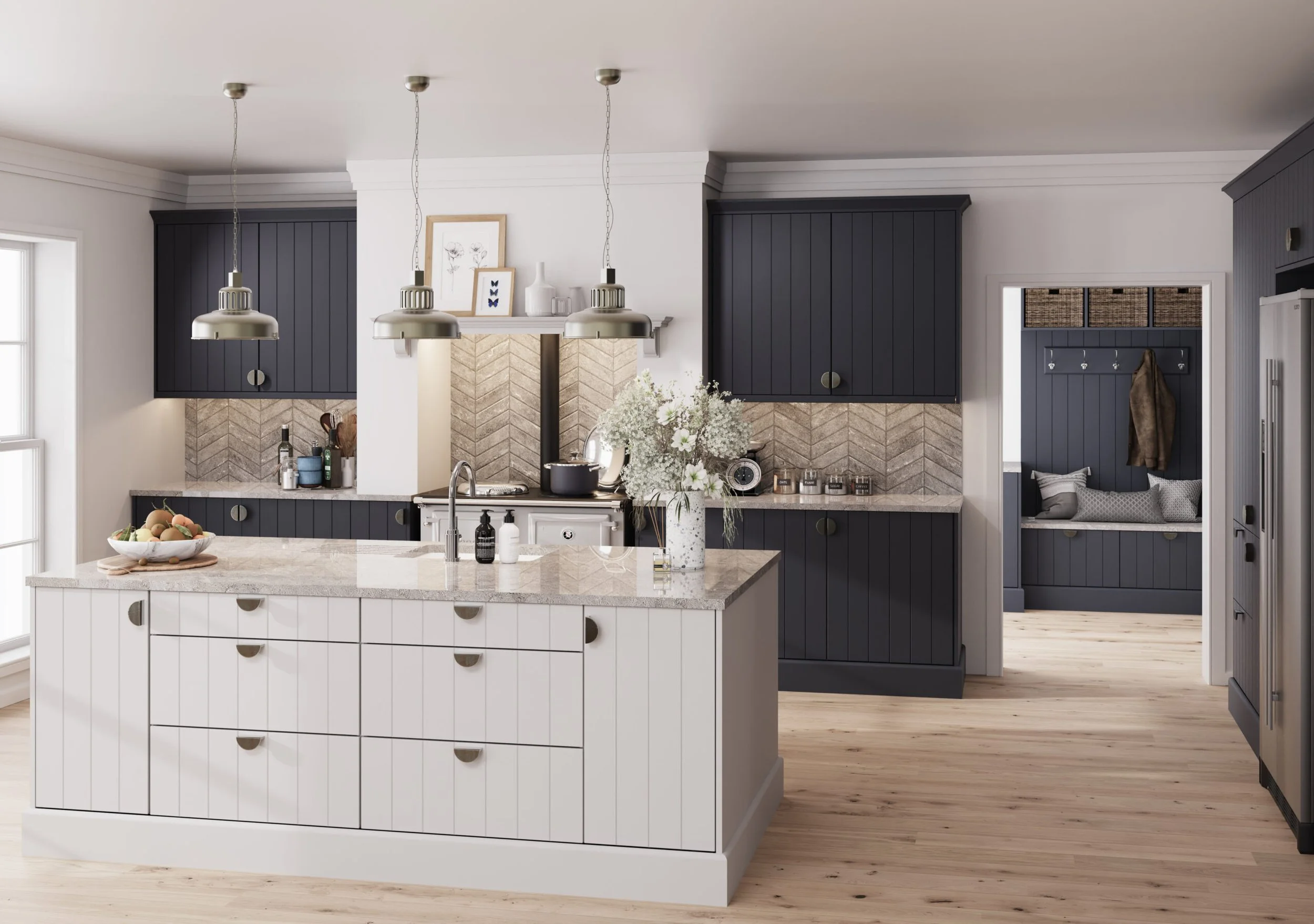Modern kitchen with a white island, black cabinets, beige chevron backsplash, and a cozy nook with cushions