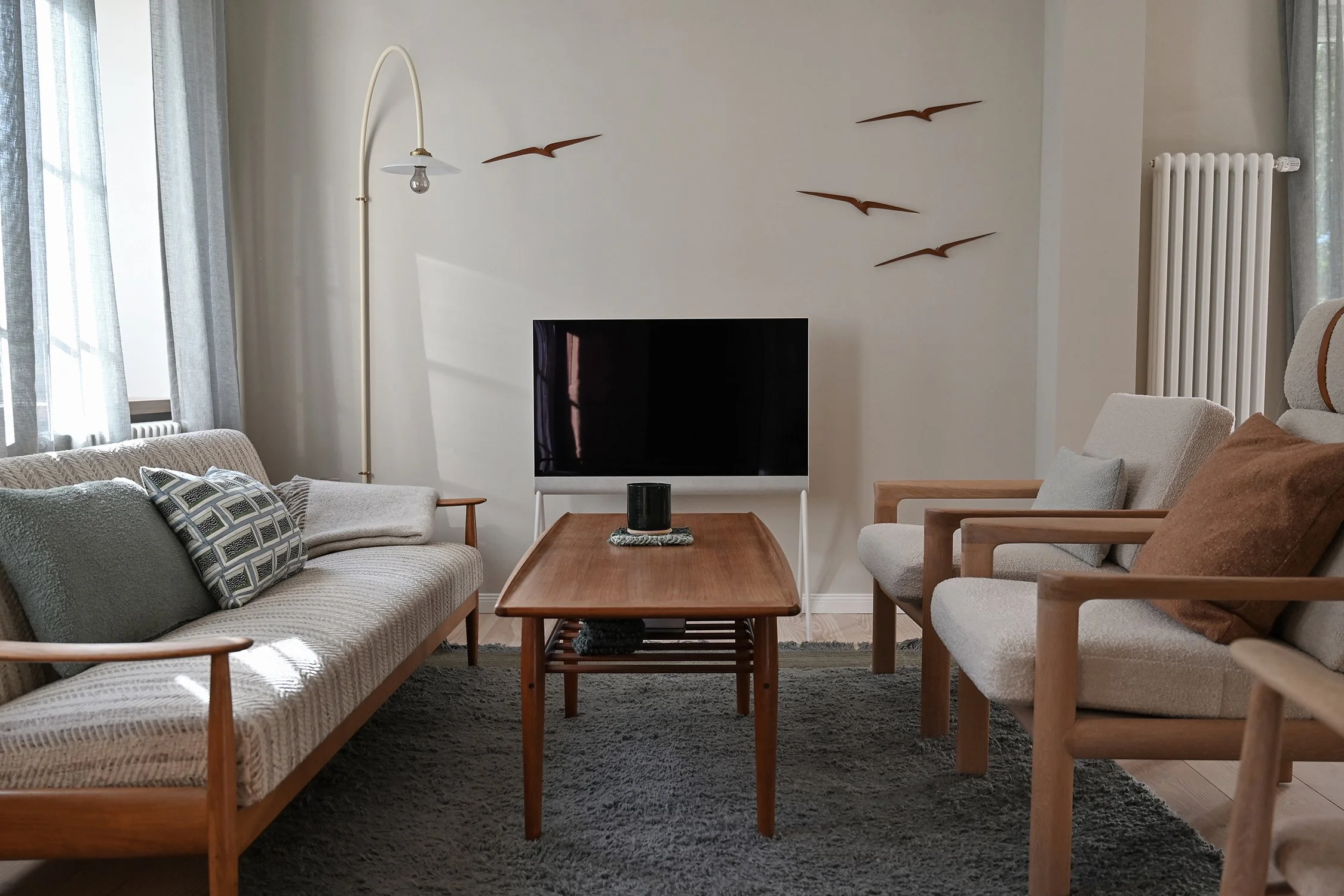 Wohnzimmer mit Vintage-Möbeln gestaltet von Bargtied-Innenarchitektin Svenja Hansen