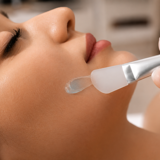 A woman using Preluma in professional skin-renewal programs as pre-cleanser