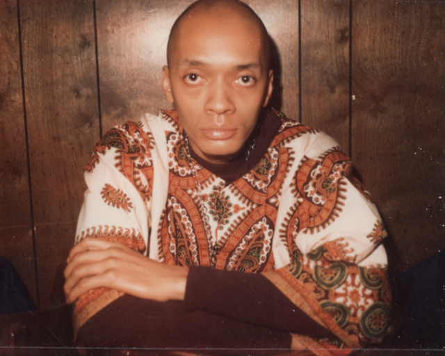 Weldon Irvine poses for a picture