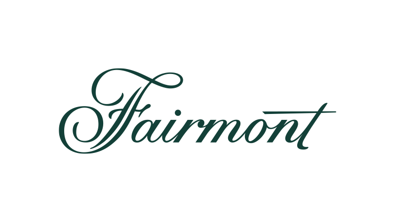 Fairmont logo in elegant cursive font on a black background.
